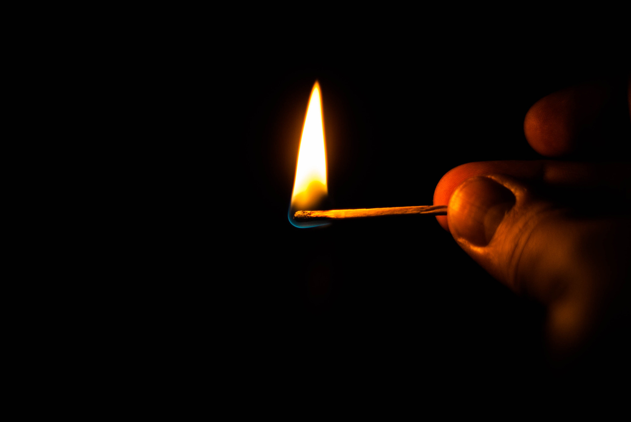 Sony Alpha DSLR-A200 + Minolta AF 50mm F1.7 sample photo. Match fire photography