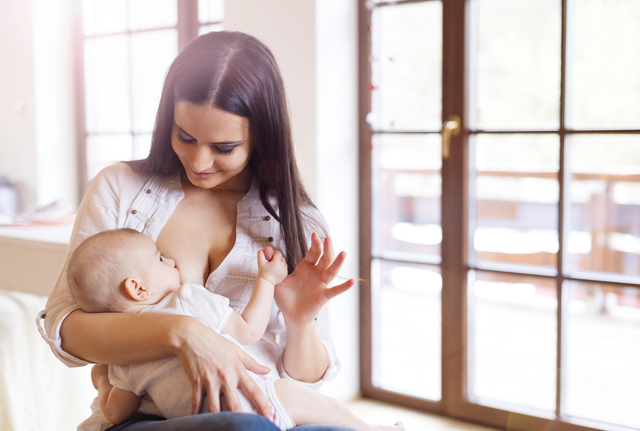 Nikon D4S + Nikon AF Nikkor 50mm F1.8D sample photo. Mother breastfeeding her baby photography