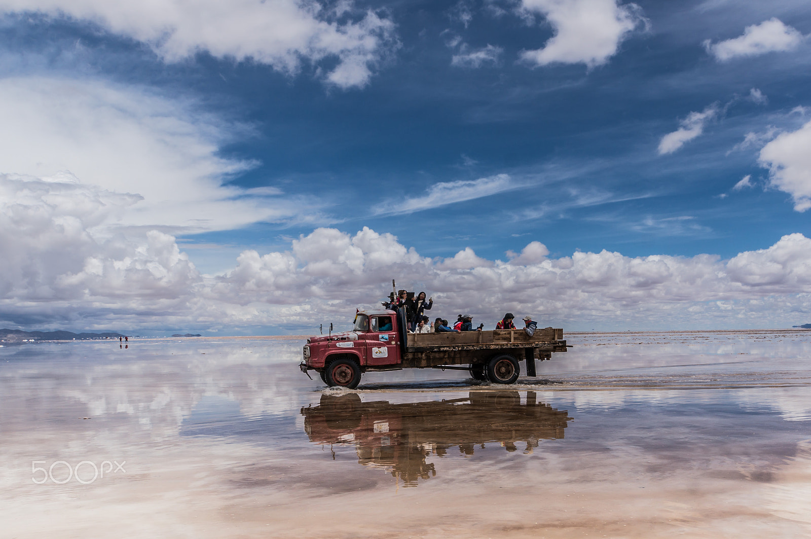 Sony E 18-200mm F3.5-6.3 OSS LE sample photo. Driving on the salar under water 2 photography