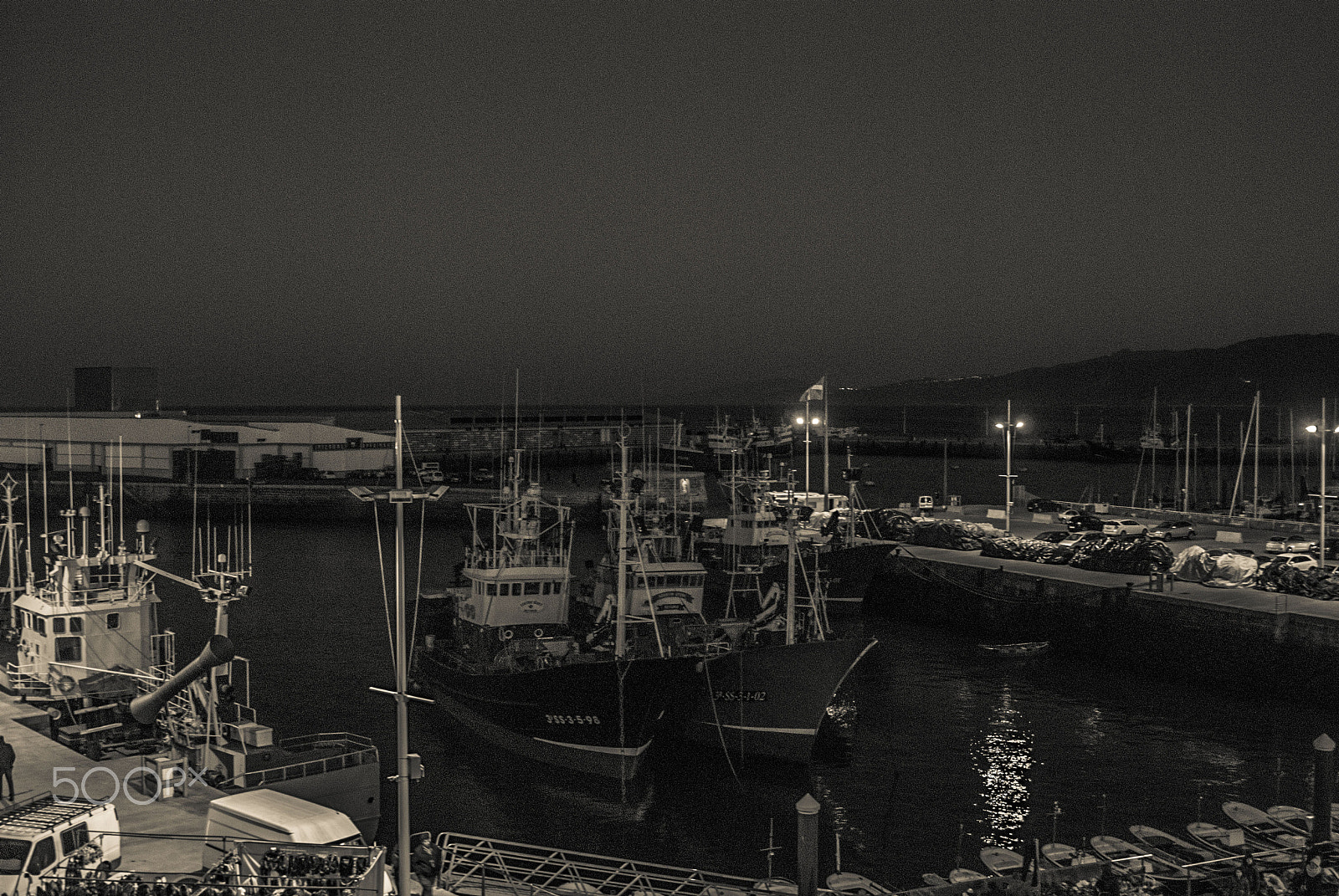 Sigma 24-70mm F2.8 EX DG HSM sample photo. Some boats in the night photography
