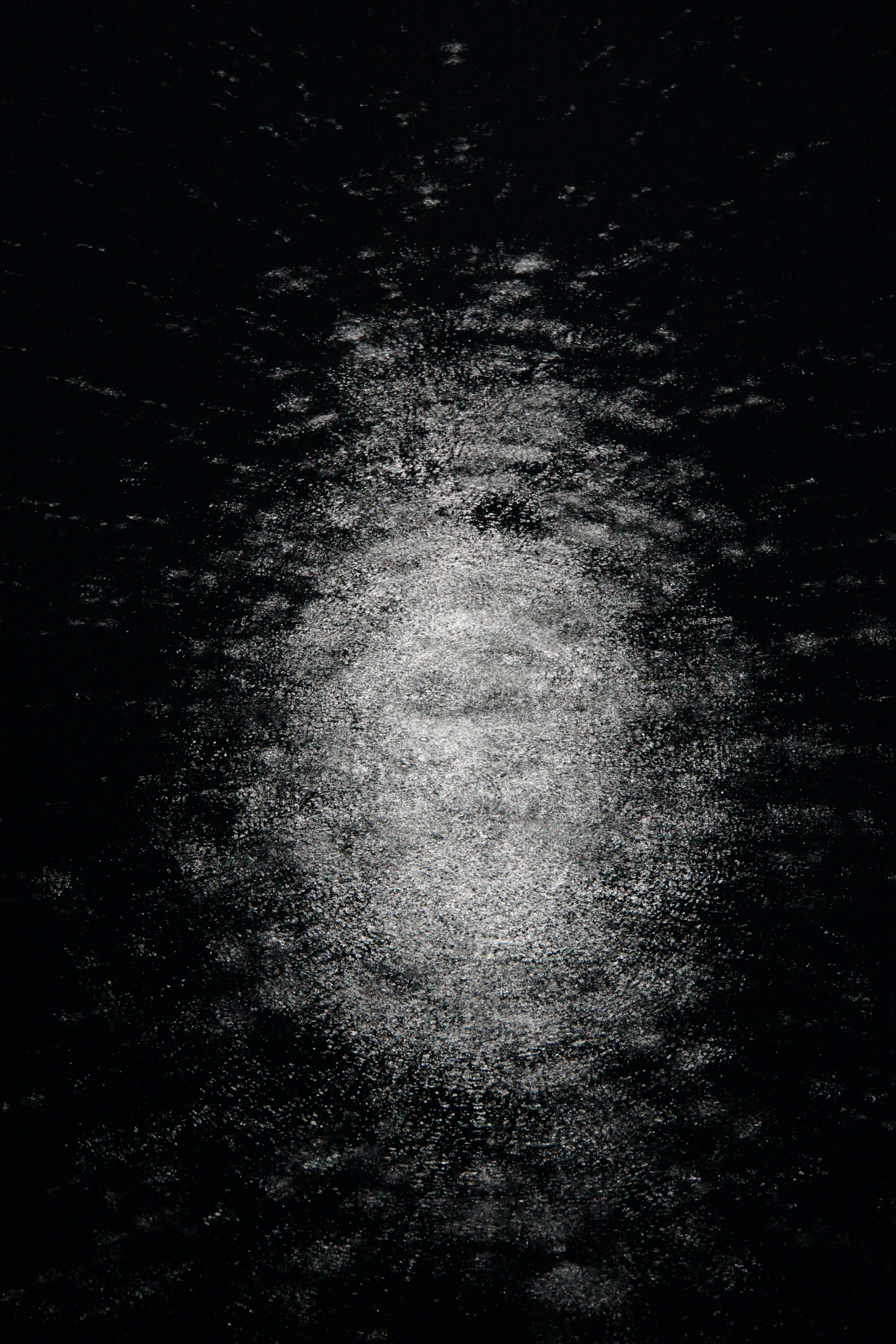 Sony FE 28-70mm F3.5-5.6 OSS sample photo. Raindrops on sea reflection of streetlight photography