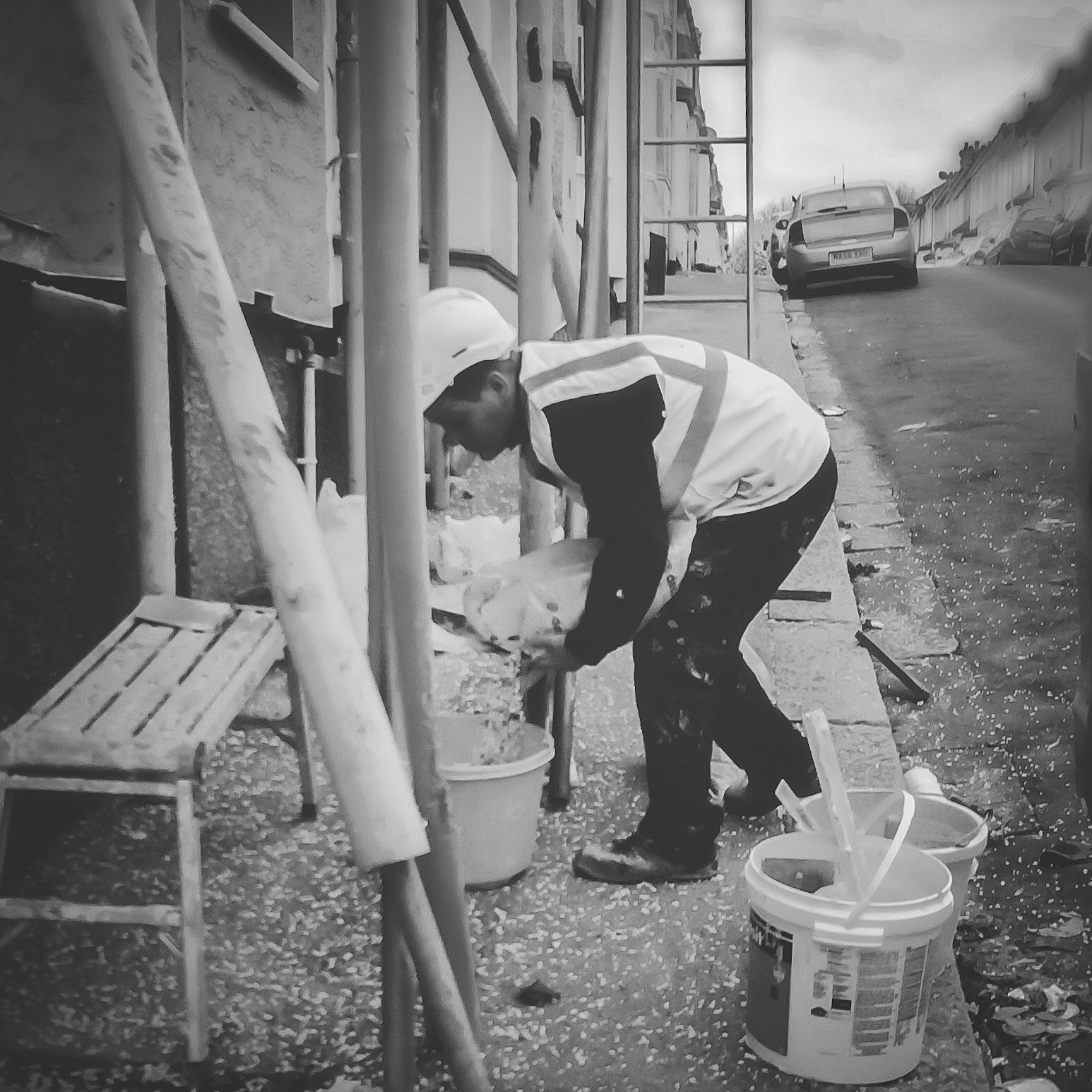 Hipstamatic 304 sample photo. Workman doing plastering photography