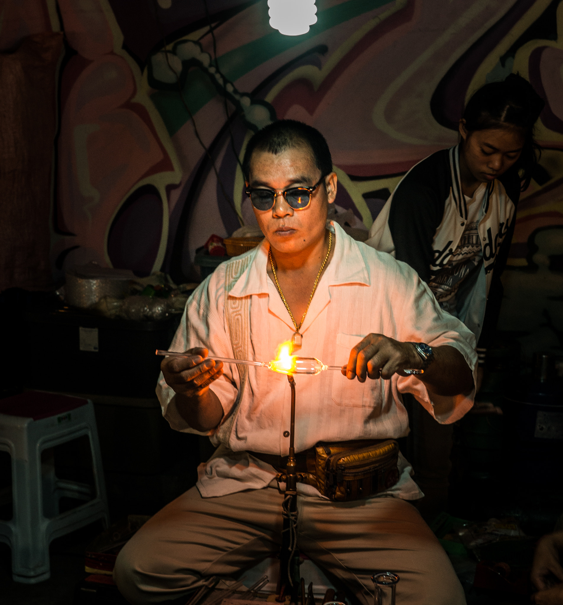 Sony Alpha NEX-6 + Minolta AF 28mm F2 sample photo. Glass-maker working on a trinket photography