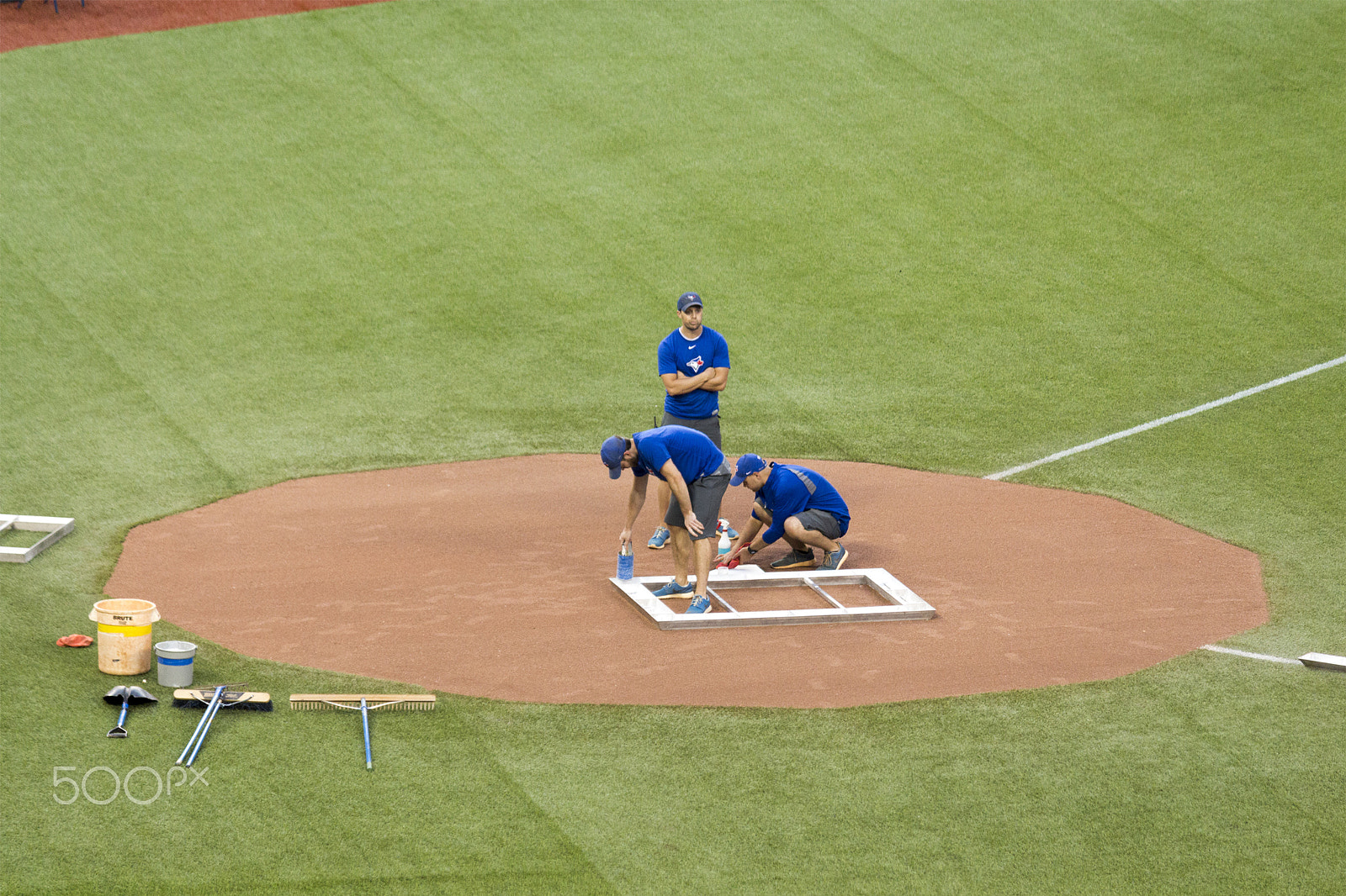 Canon EOS 650D (EOS Rebel T4i / EOS Kiss X6i) sample photo. Grounds crew prepares the home plate area for a baseball game at rogers centre in toronto, ontario,  photography