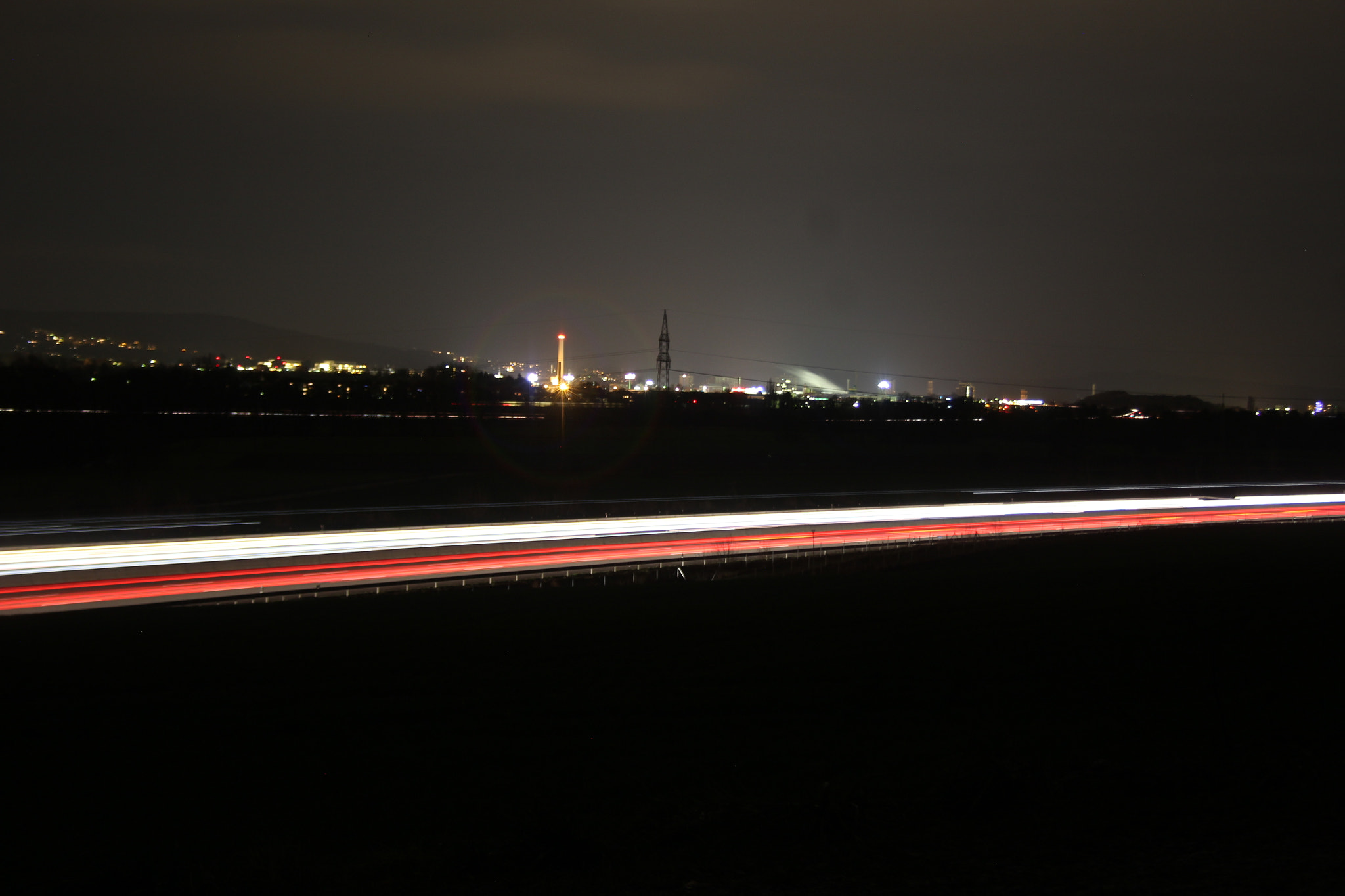 Canon EF-S 18-55mm F3.5-5.6 sample photo. City by night - red-white photography
