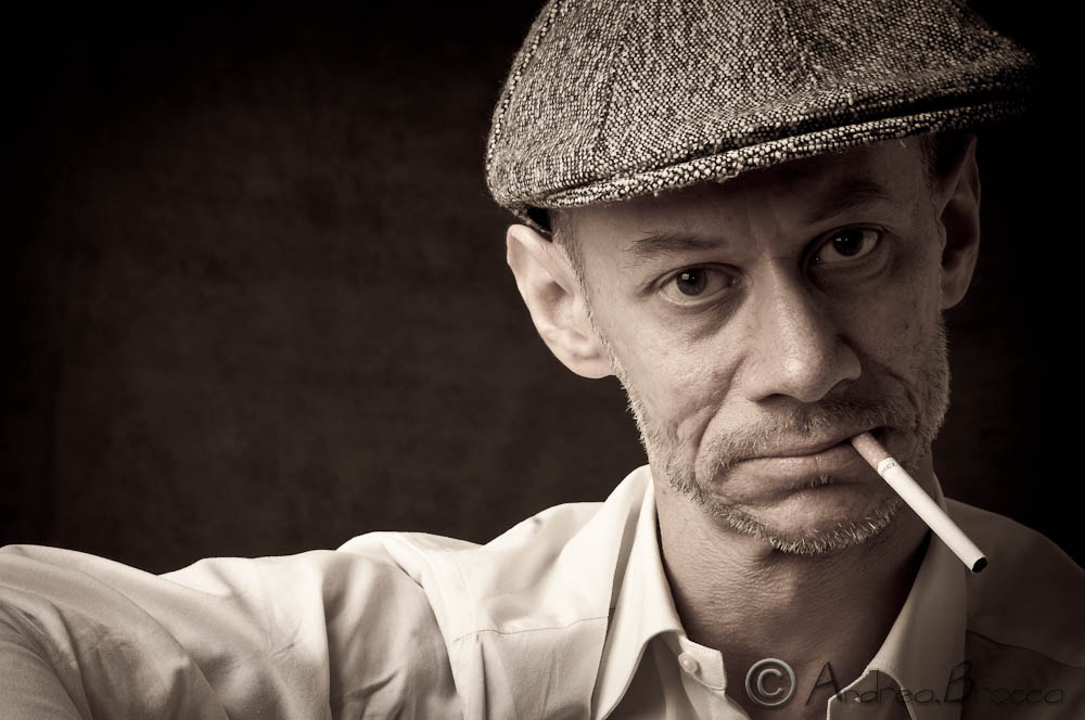 Nikon D300S + Nikon AF Nikkor 85mm F1.8D sample photo. Hat & cigarette photography