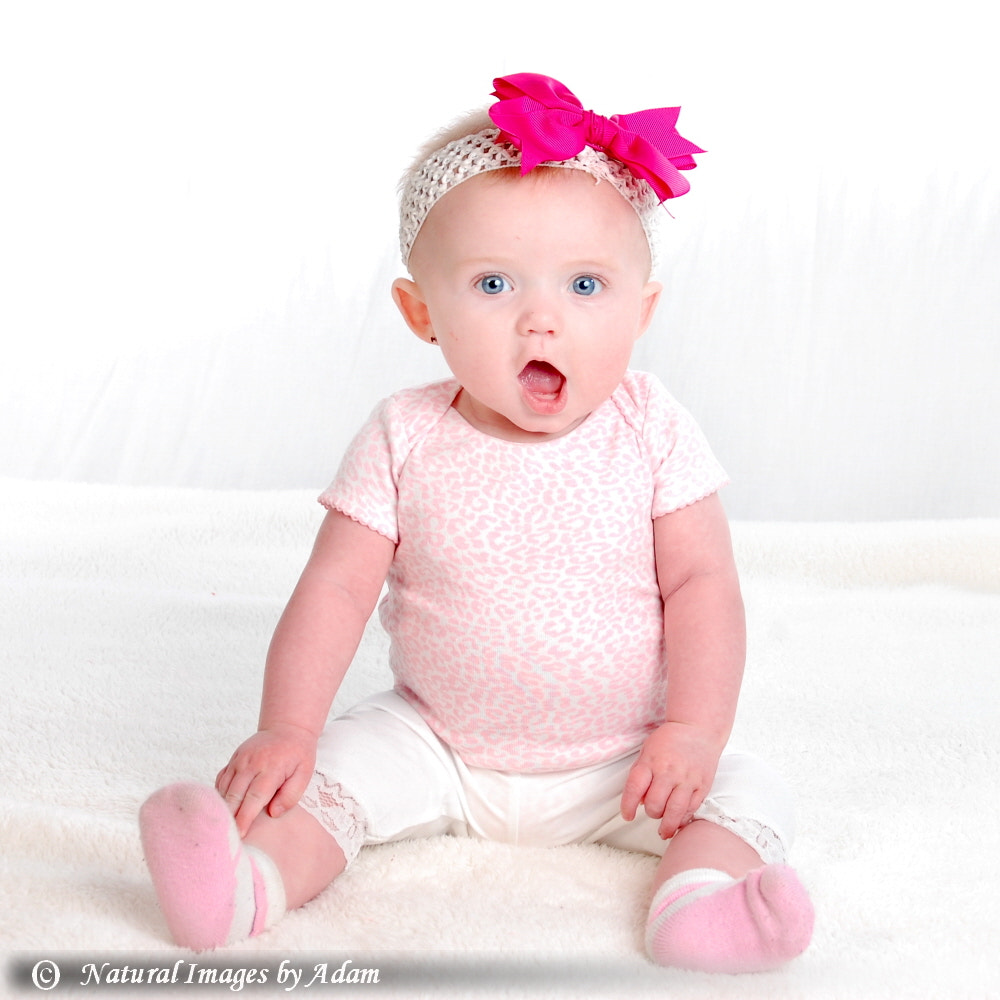 Nikon D40 sample photo. Pink bow baby girl - six(ish) months old photography