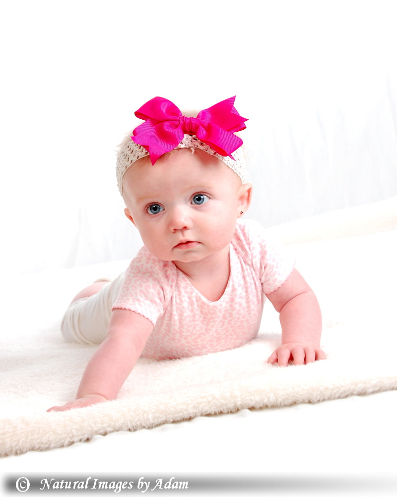 Nikon D40 sample photo. Pink bow baby girl - six(ish) months old photography
