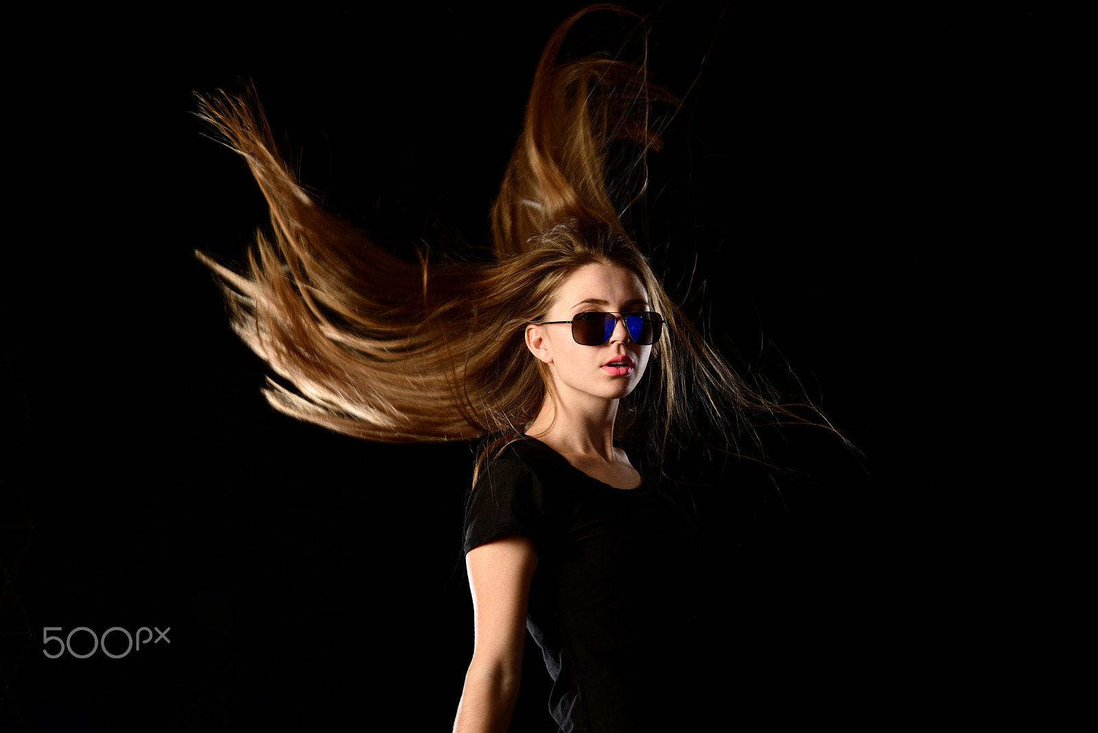 Nikon D810 + Nikon AF Nikkor 105mm F2D DC sample photo. Teenage girl with streaming hair and sunglasses photography
