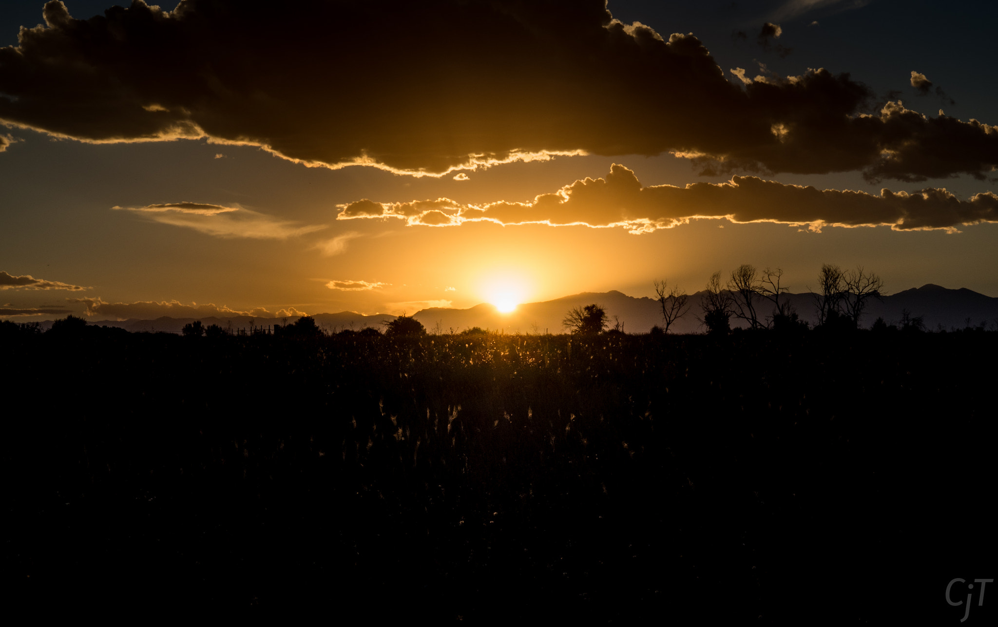 Olympus OM-D E-M10 + LUMIX G VARIO PZ 14-42/F3.5-5.6 sample photo. Brighton colorado sunset photography