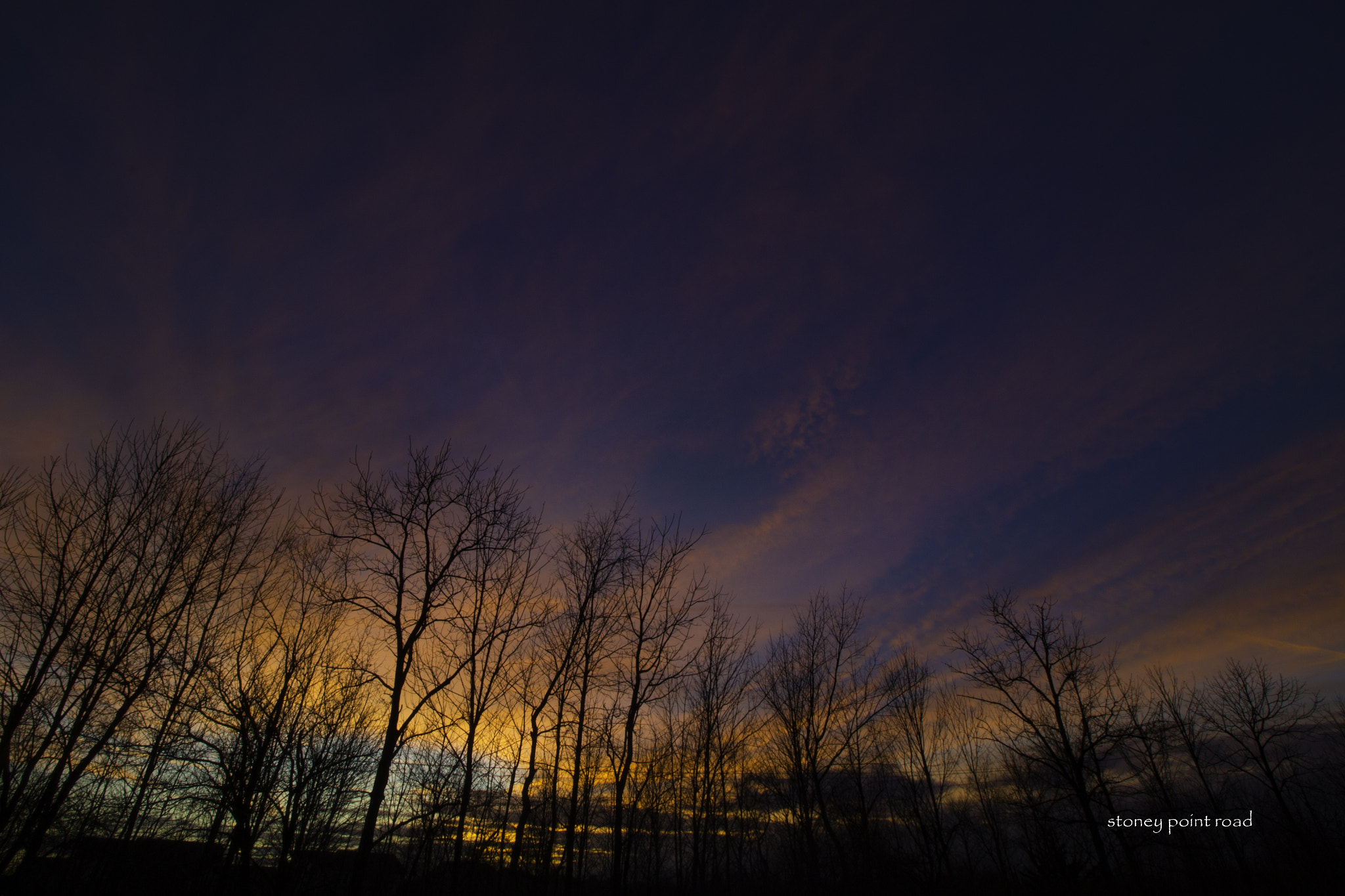 Canon EF-S 10-18mm F4.5–5.6 IS STM sample photo. Sunset over trees photography