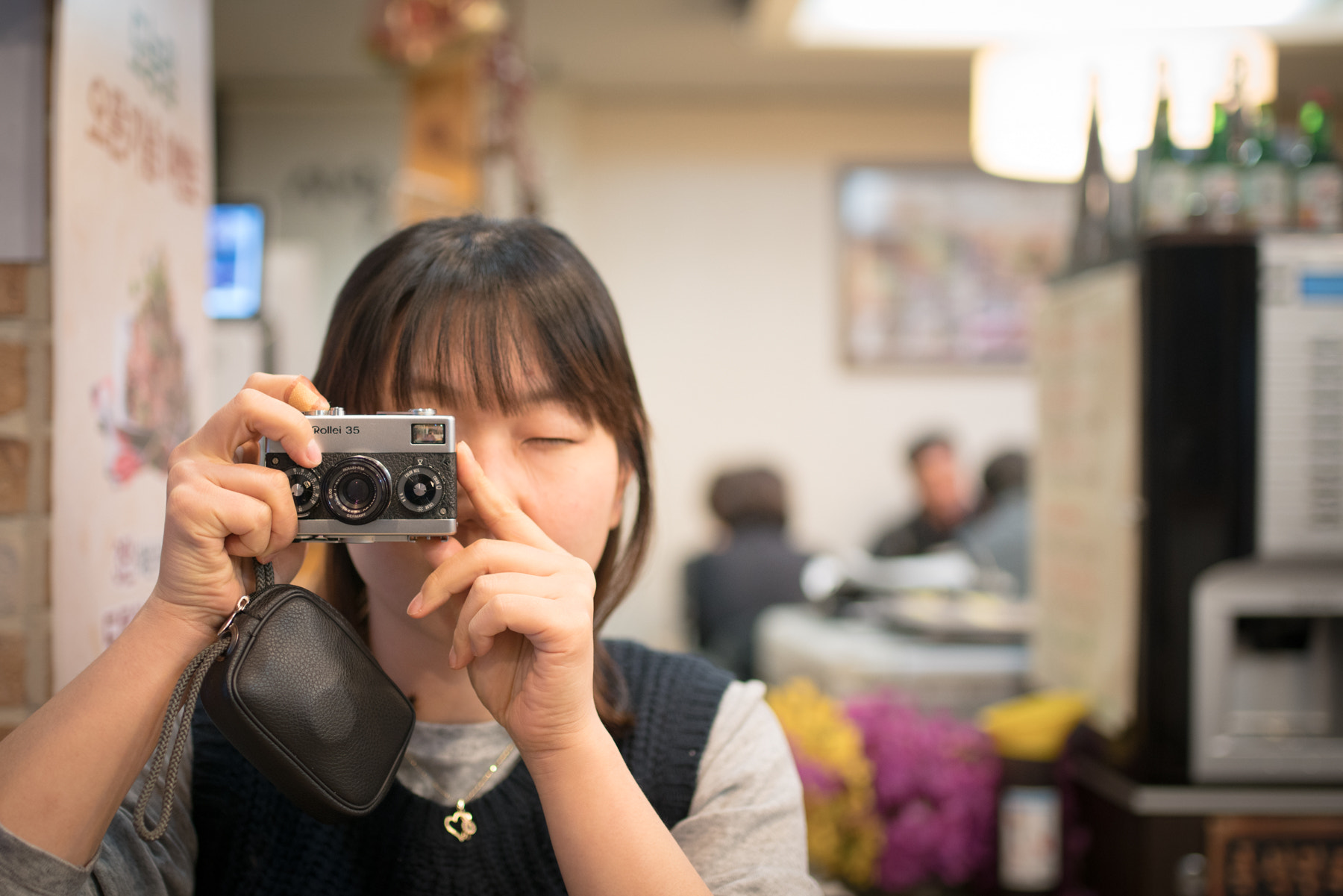 Sony a7R II + Sigma 35mm F1.4 DG HSM Art sample photo. Wife with rollei35s photography