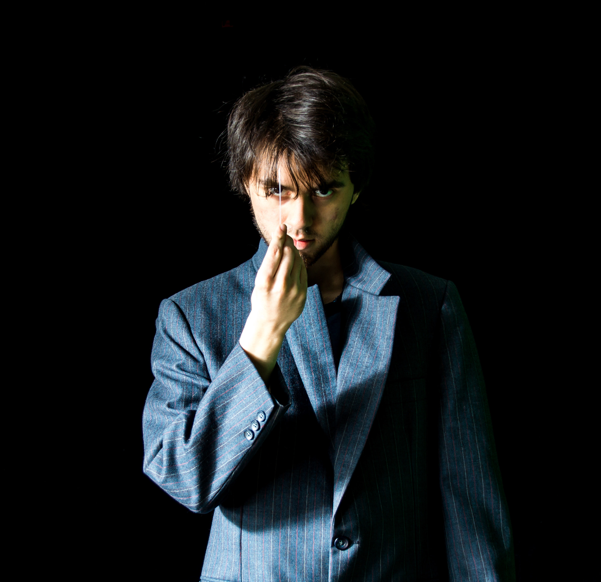 Sony SLT-A57 + Tamron AF 28-105mm F4-5.6 [IF] sample photo. Young man in suit jacket - center photography