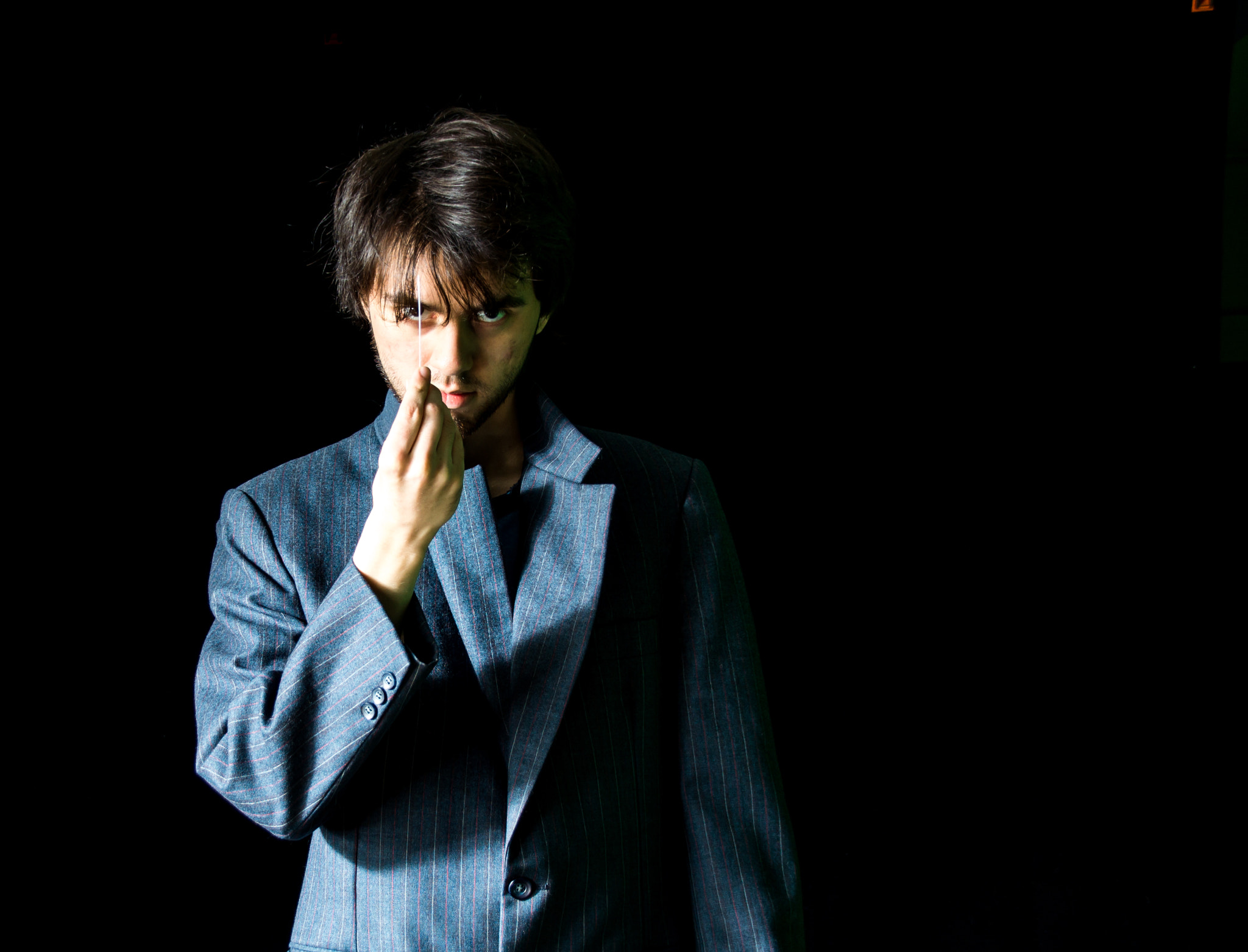 Sony SLT-A57 + Tamron AF 28-105mm F4-5.6 [IF] sample photo. Young man in suit jacket - left photography