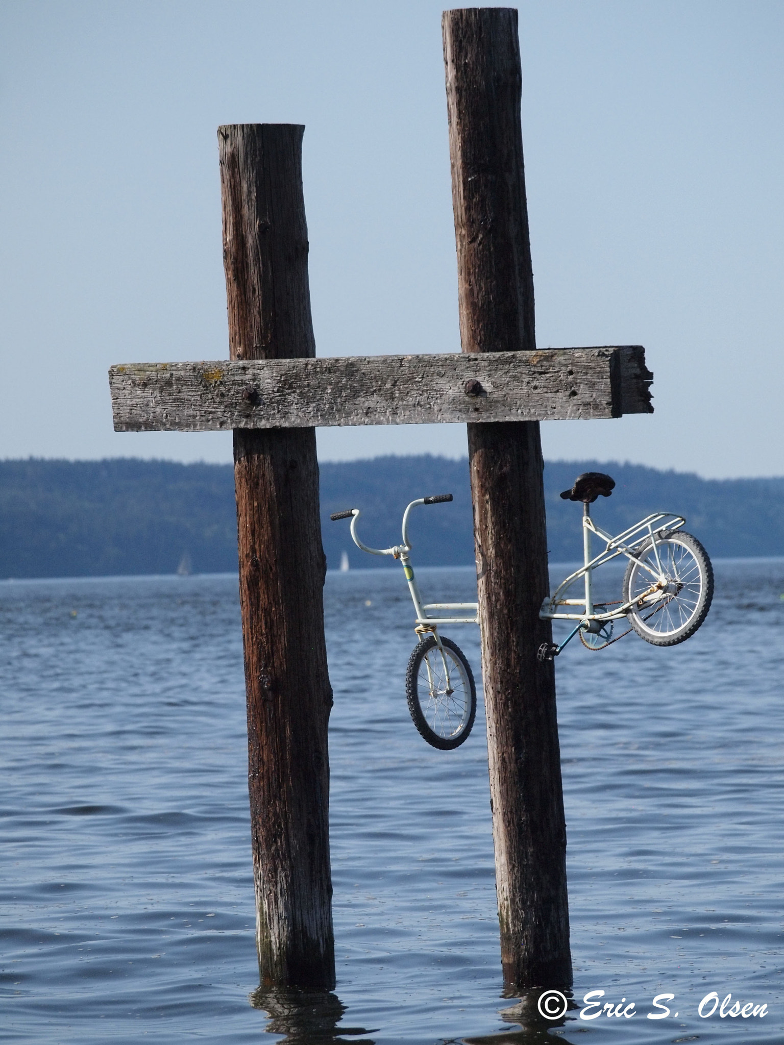 Olympus PEN E-P1 sample photo. Bike over water photography