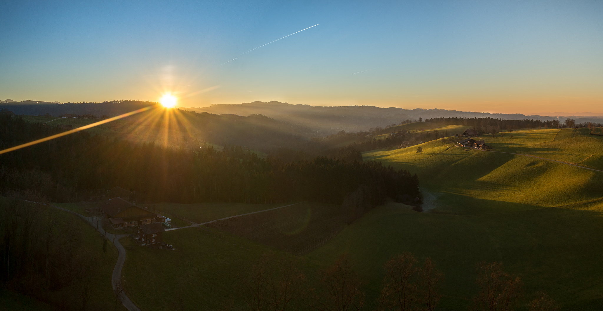 Sony Alpha NEX-5T + Sony E 16mm F2.8 sample photo. Summerly sunset in december photography