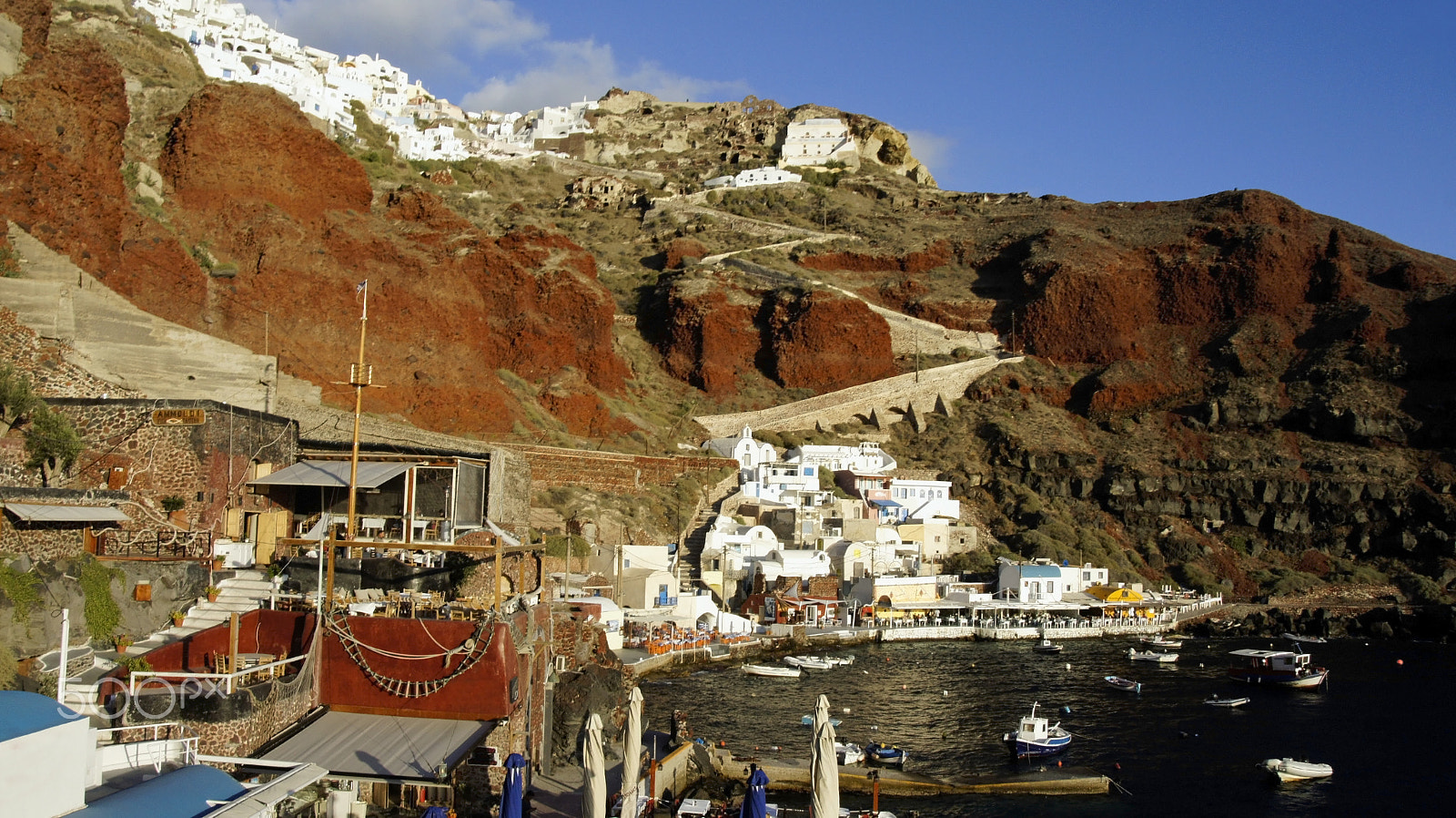 Sony Alpha NEX-3 + Sony E 18-200mm F3.5-6.3 OSS sample photo. Small harbor of akrotiri on greece island santorini photography