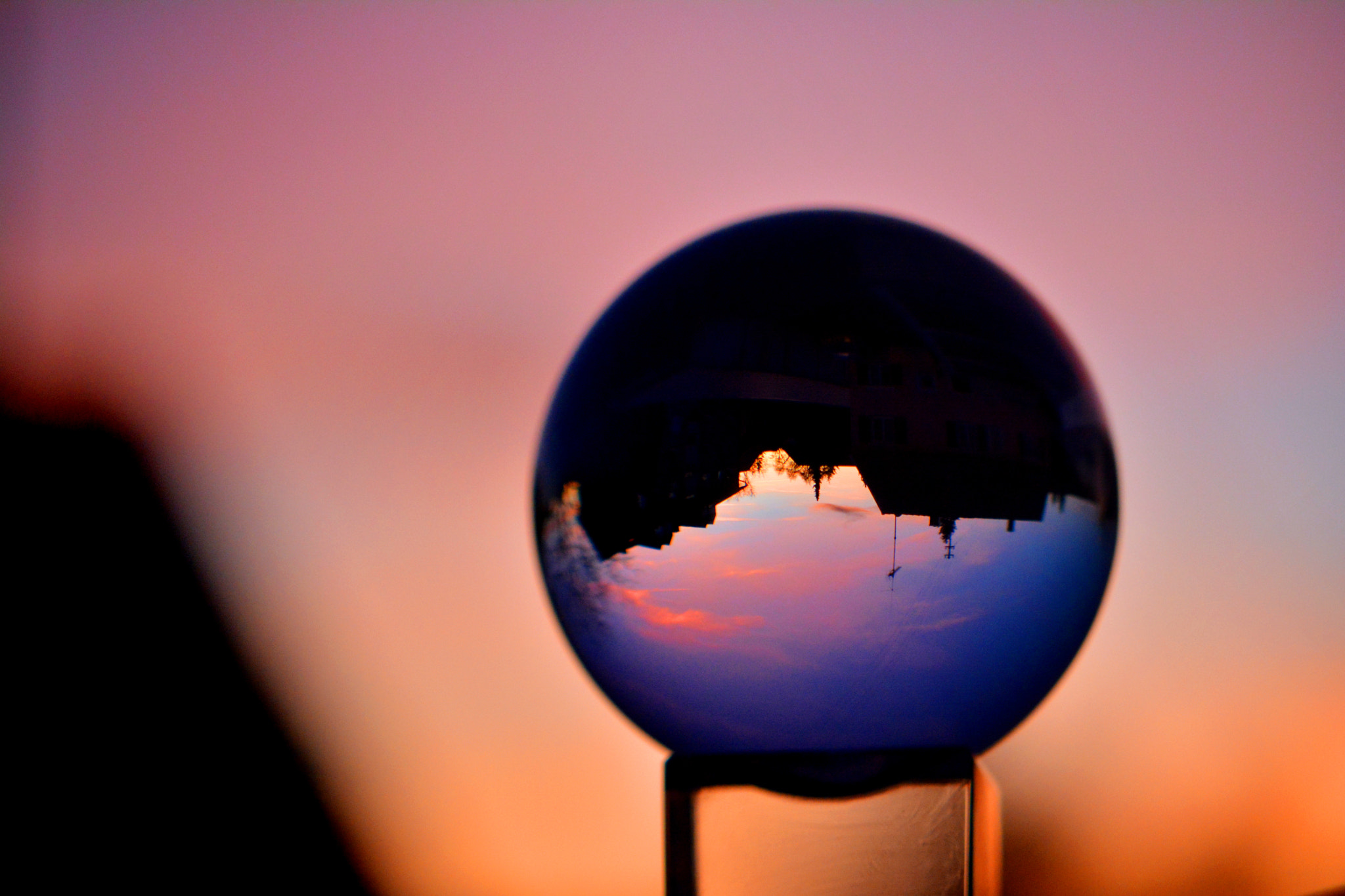 Nikon AF-S DX Micro-Nikkor 85mm F3.5G ED VR sample photo. Sundown through a glassball photography