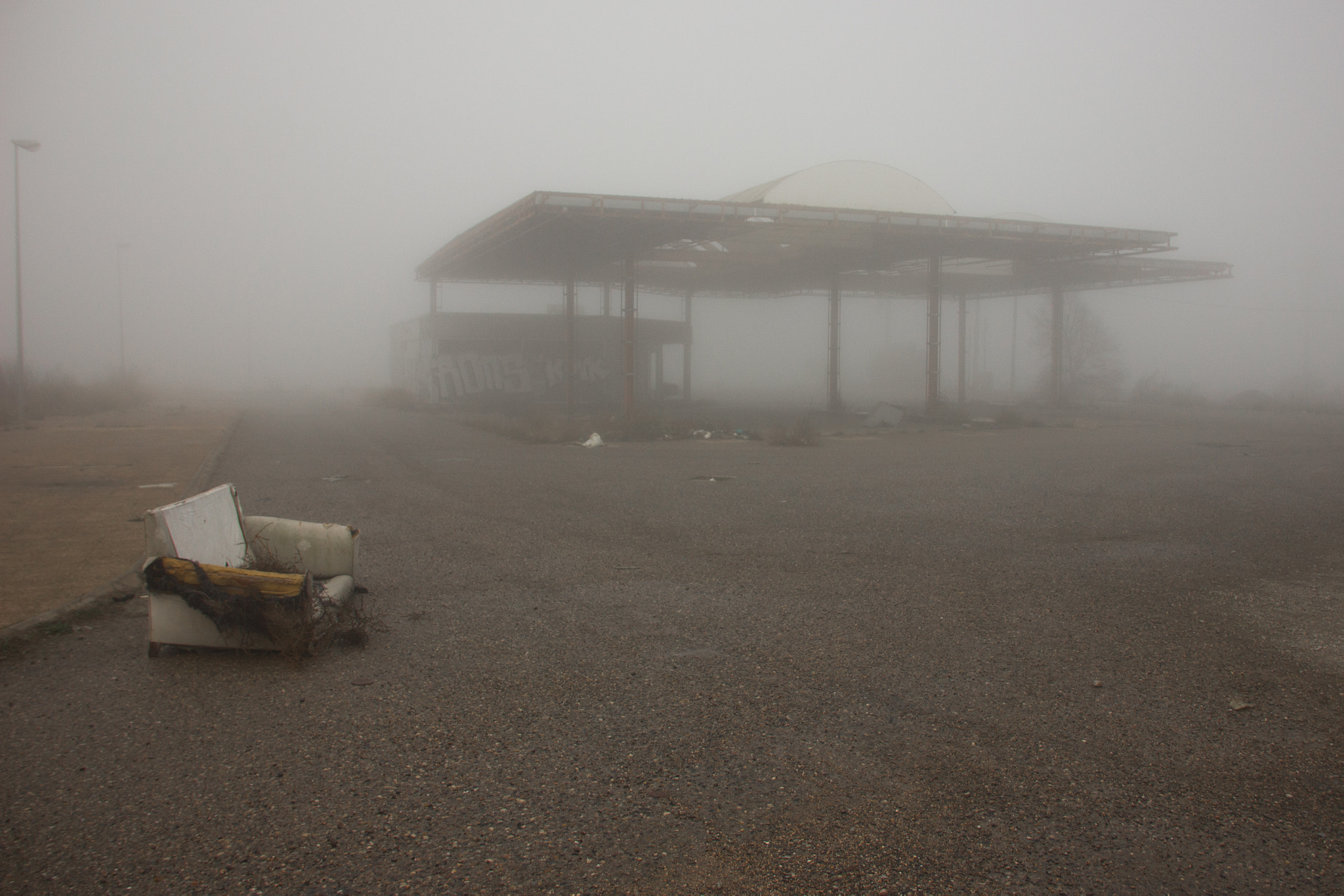 Sigma 18-125mm F3.8-5.6 DC OS HSM sample photo. Abandoned petrol station photography