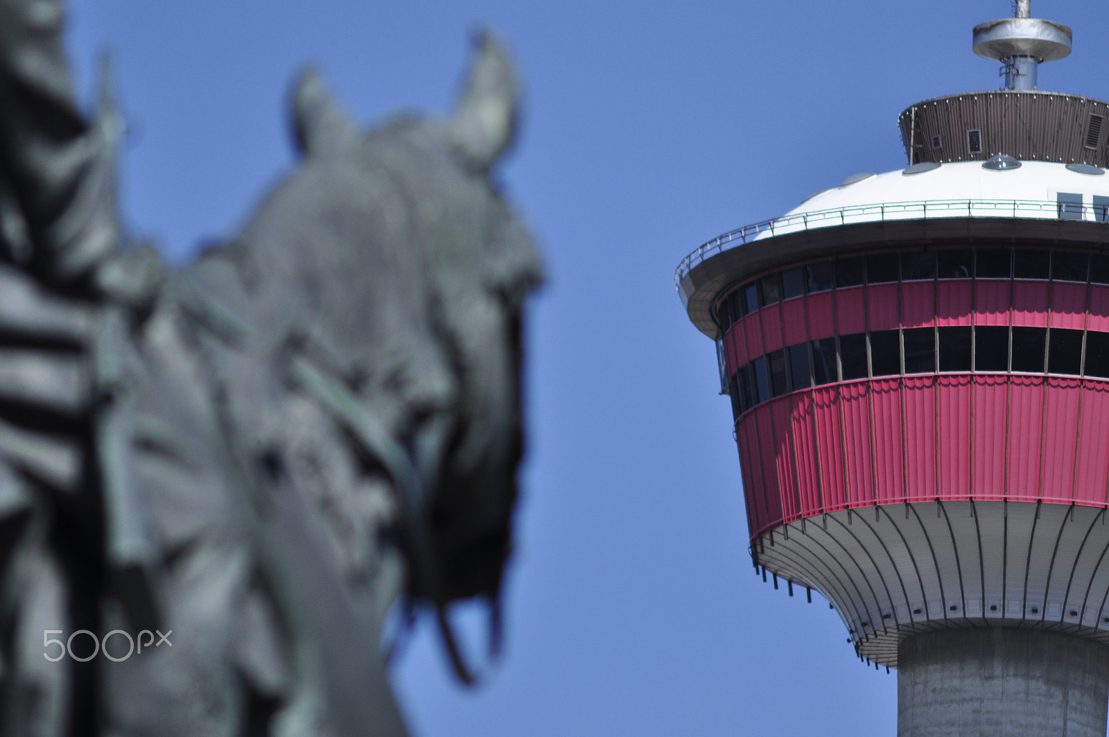 Nikon D90 + AF Zoom-Nikkor 75-300mm f/4.5-5.6 sample photo. Calgary tower from central memorial park photography