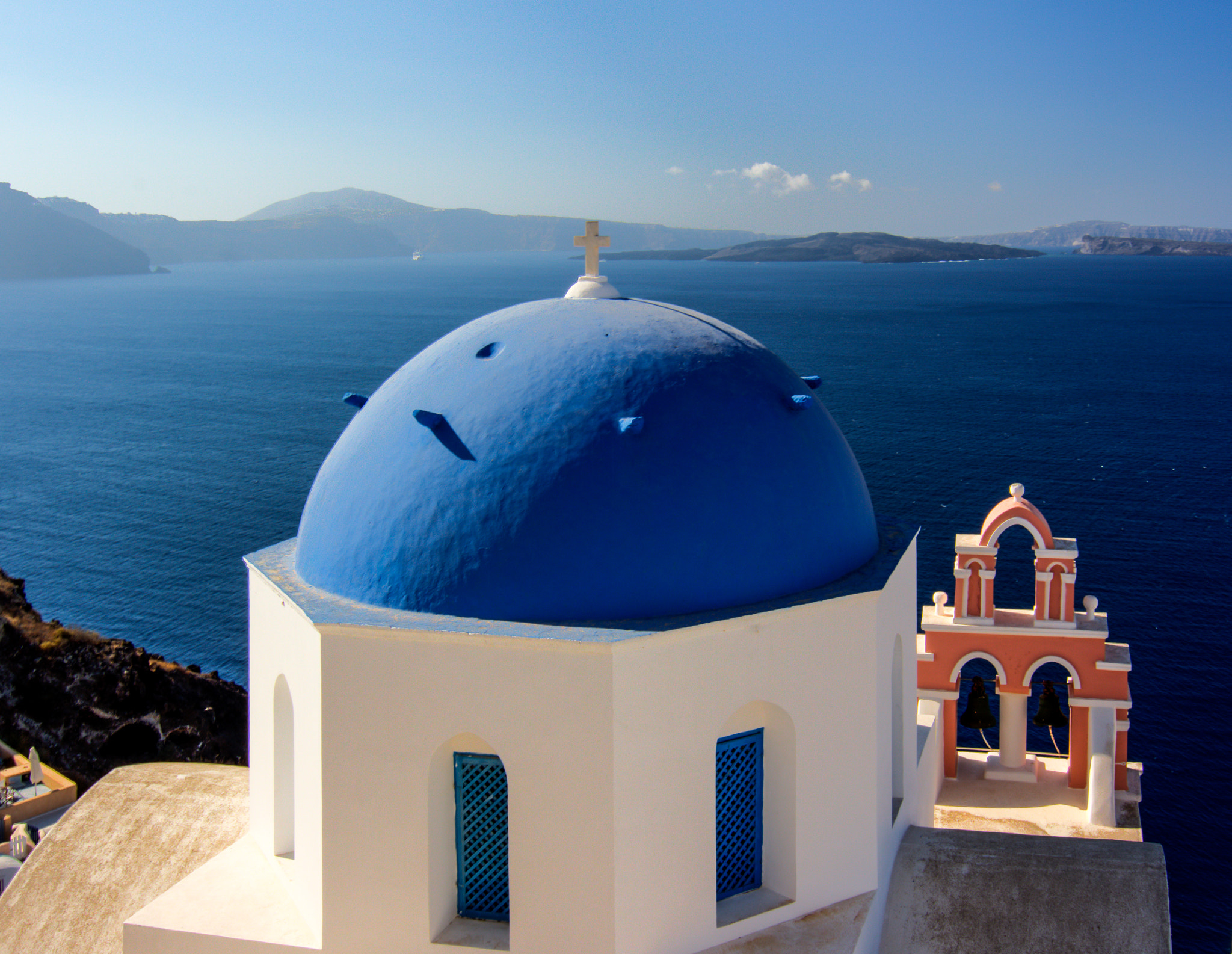 Tokina AT-X 12-28mm F4 Pro DX sample photo. Blue domed church in oia santorini photography