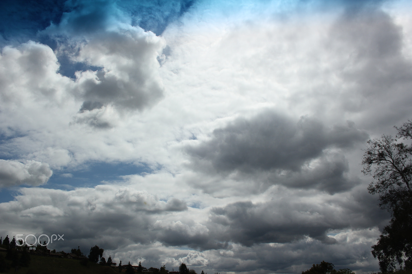 Canon EF-S 18-55mm F3.5-5.6 sample photo. Clouds photography