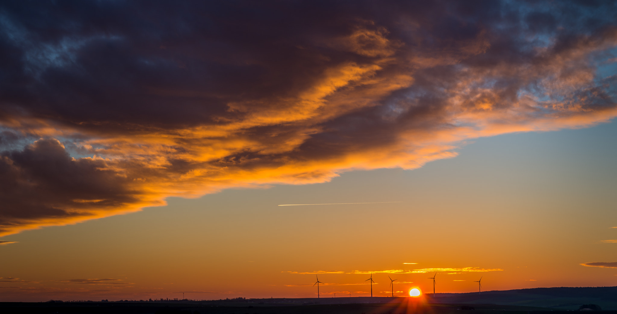 Pentax K-5 II + Pentax smc DA 50mm F1.8 sample photo. Sunset near the wind turbines photography