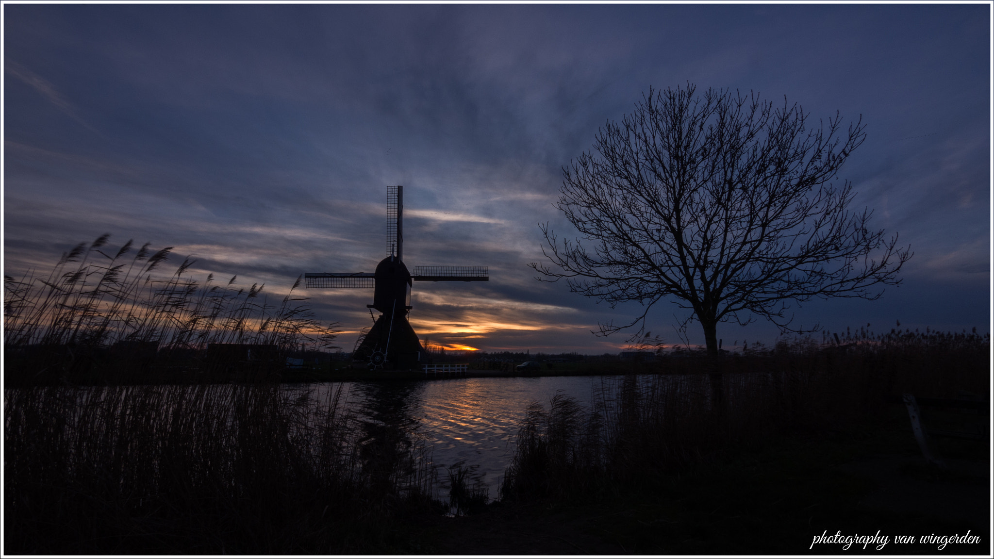 Olympus OM-D E-M10 II + Panasonic Lumix G Vario 7-14mm F4 ASPH sample photo. Kinderdijk windmill photography