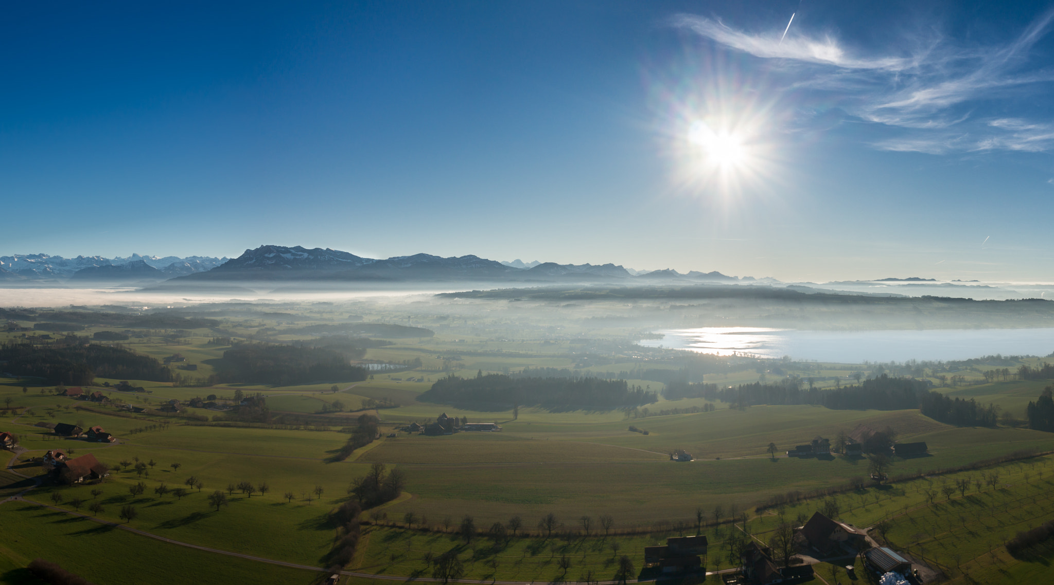 Sony Alpha NEX-5T + Sony E 16mm F2.8 sample photo. Above switzerland photography