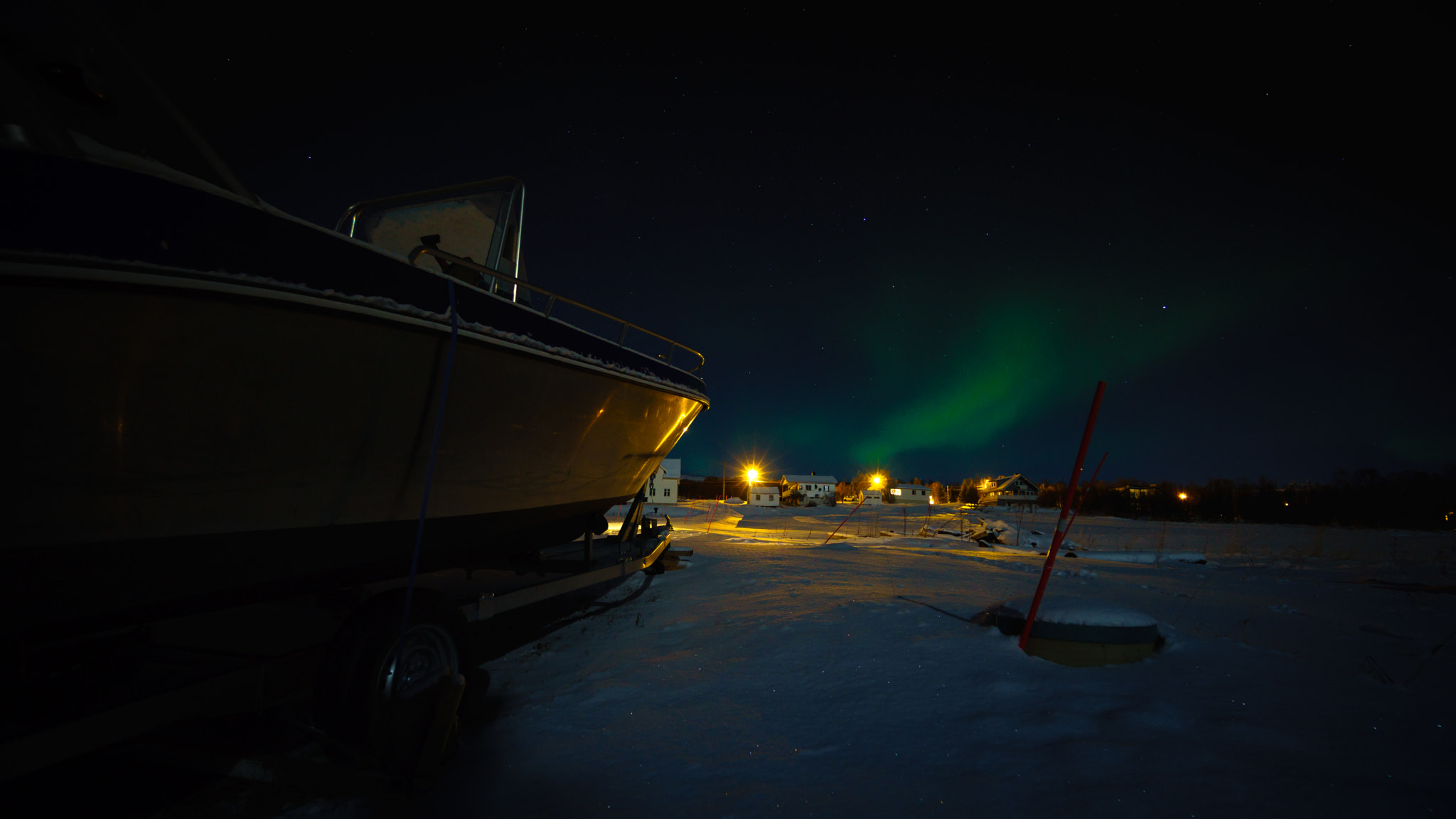 Sony a5100 + Sony E 10-18mm F4 OSS sample photo. Northern lights with boat photography