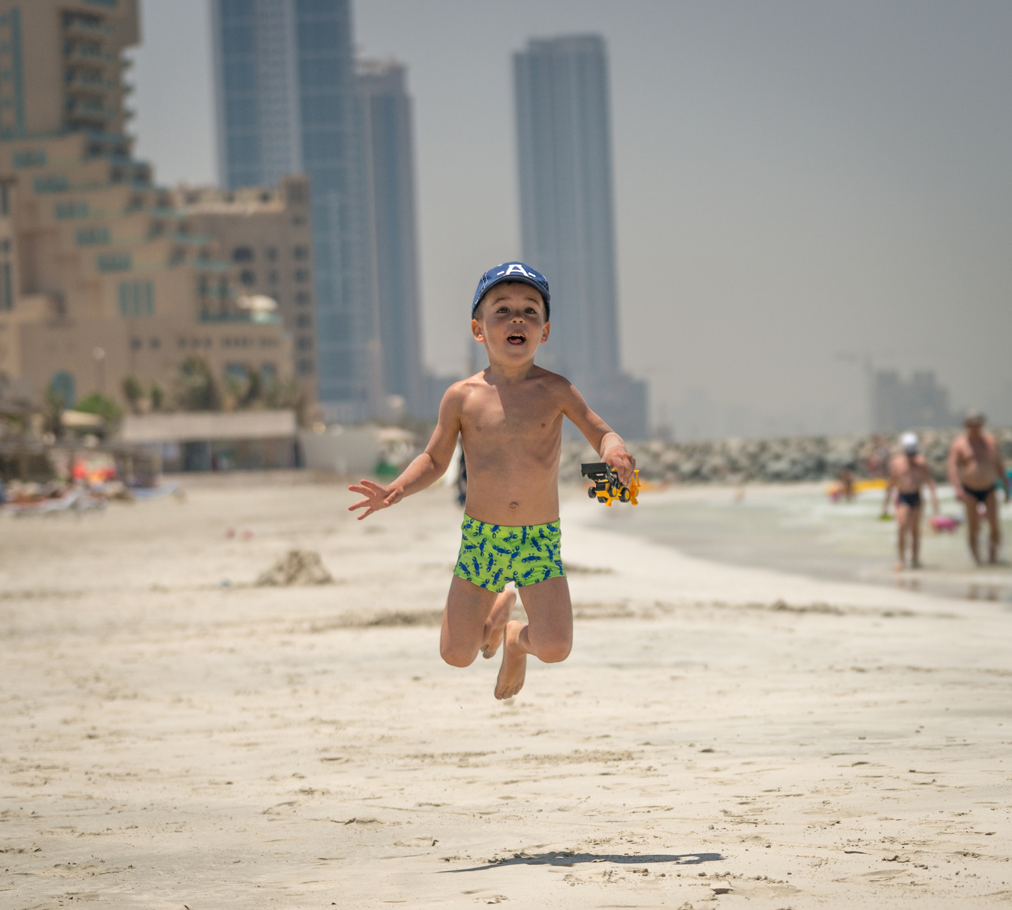 Sony 70-300mm F4.5-5.6 G SSM sample photo. Jumping on a beach photography