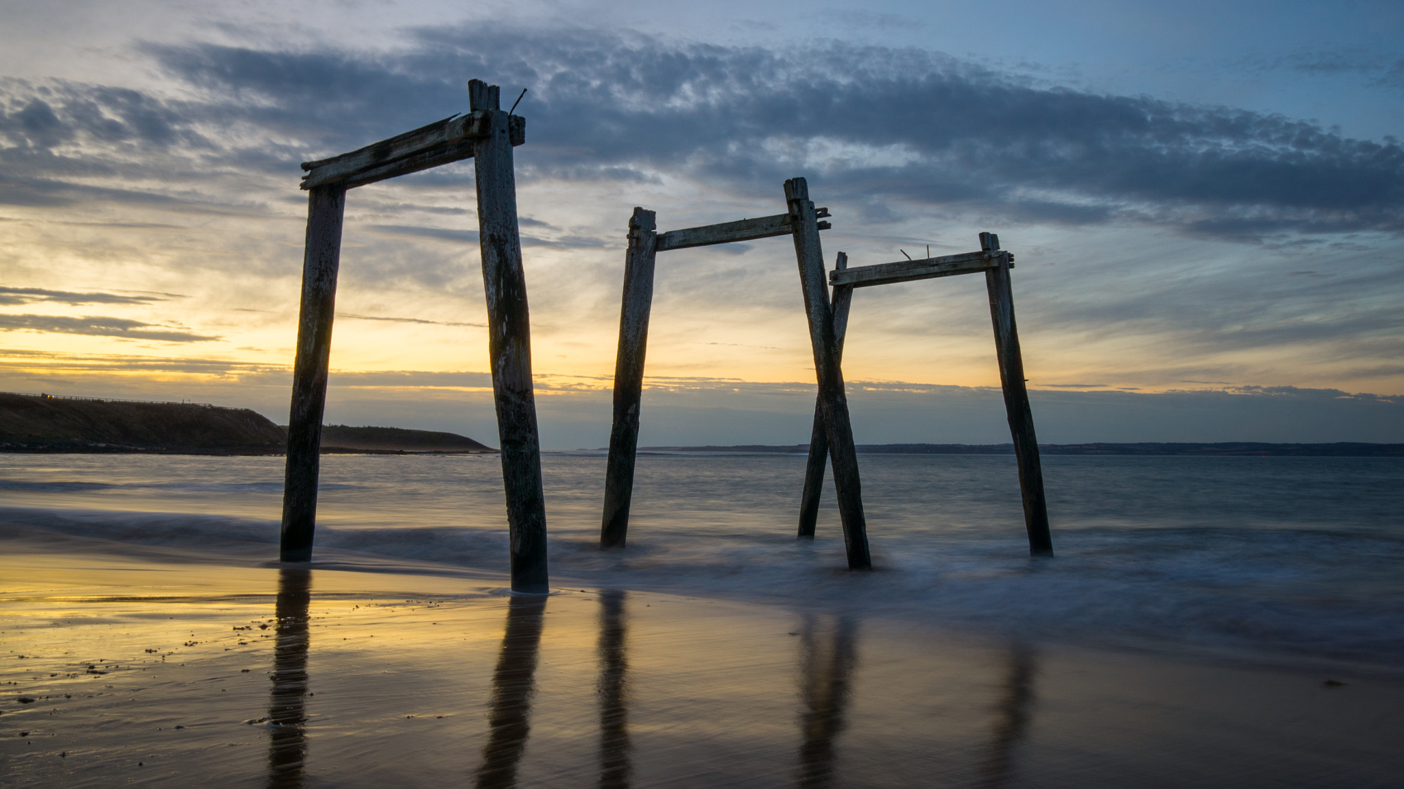 Sony Alpha NEX-5N + Sigma 19mm F2.8 EX DN sample photo. Old pier at sunset photography