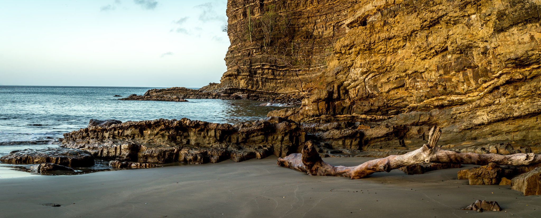 Sony Alpha a3500 + Sony E 35mm F1.8 OSS sample photo. Rocks on the beach photography