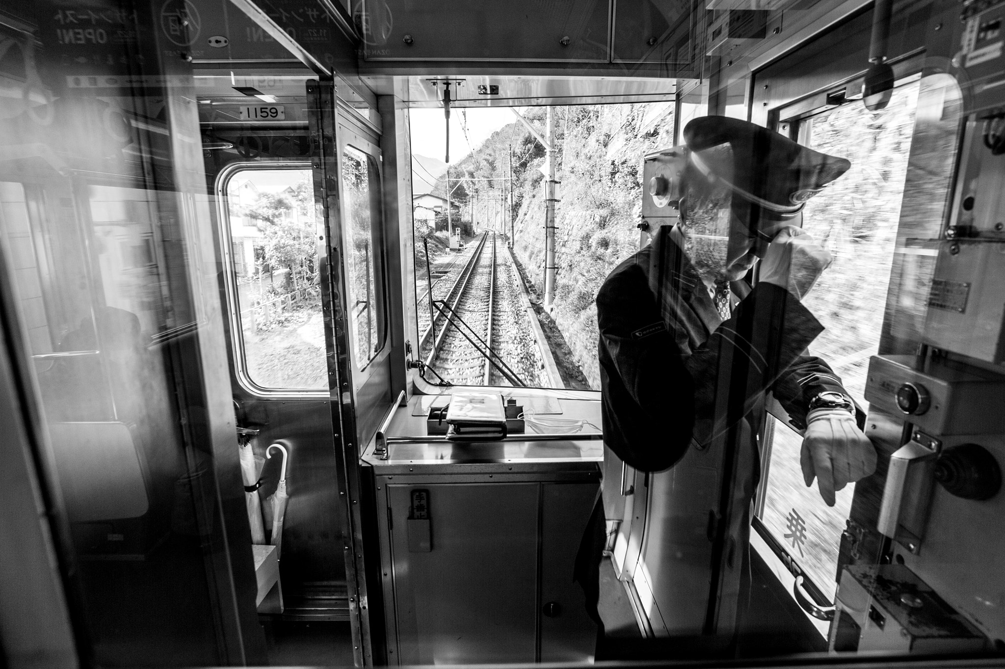 Nikon AF-S Nikkor 18-35mm F3.5-4.5G ED sample photo. Japanese train operator, hakone, japan photography