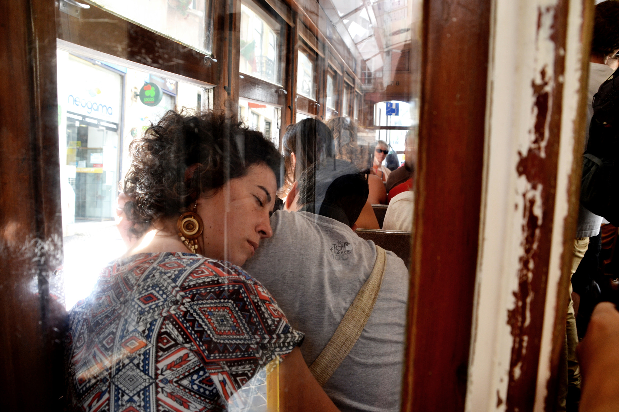 Nikon D3100 + Sigma 18-200mm F3.5-6.3 DC sample photo. Sleeping on tram 28 photography