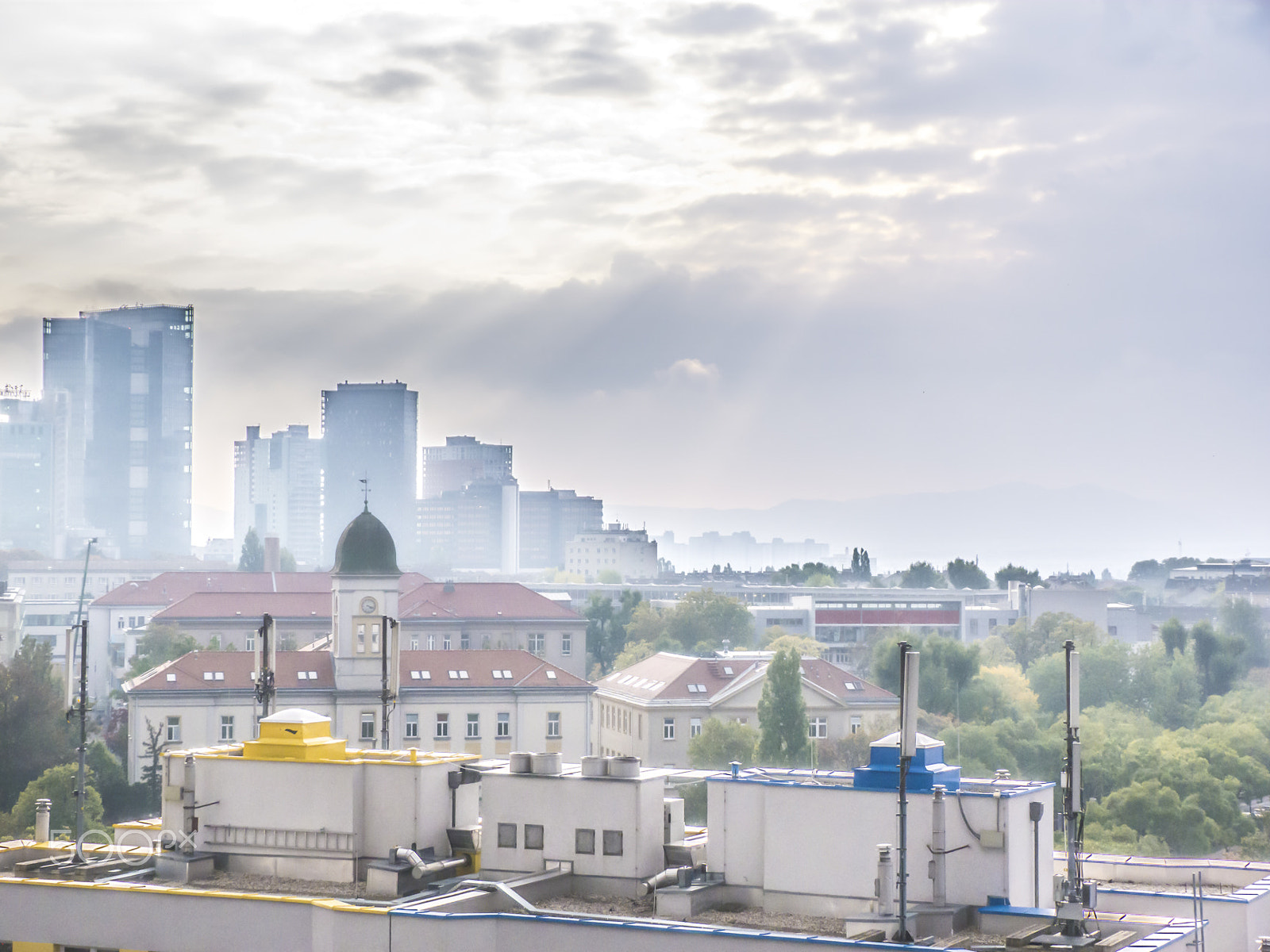 Built-in lens sample photo. Sun is breaking through clouds (wienerberg) photography