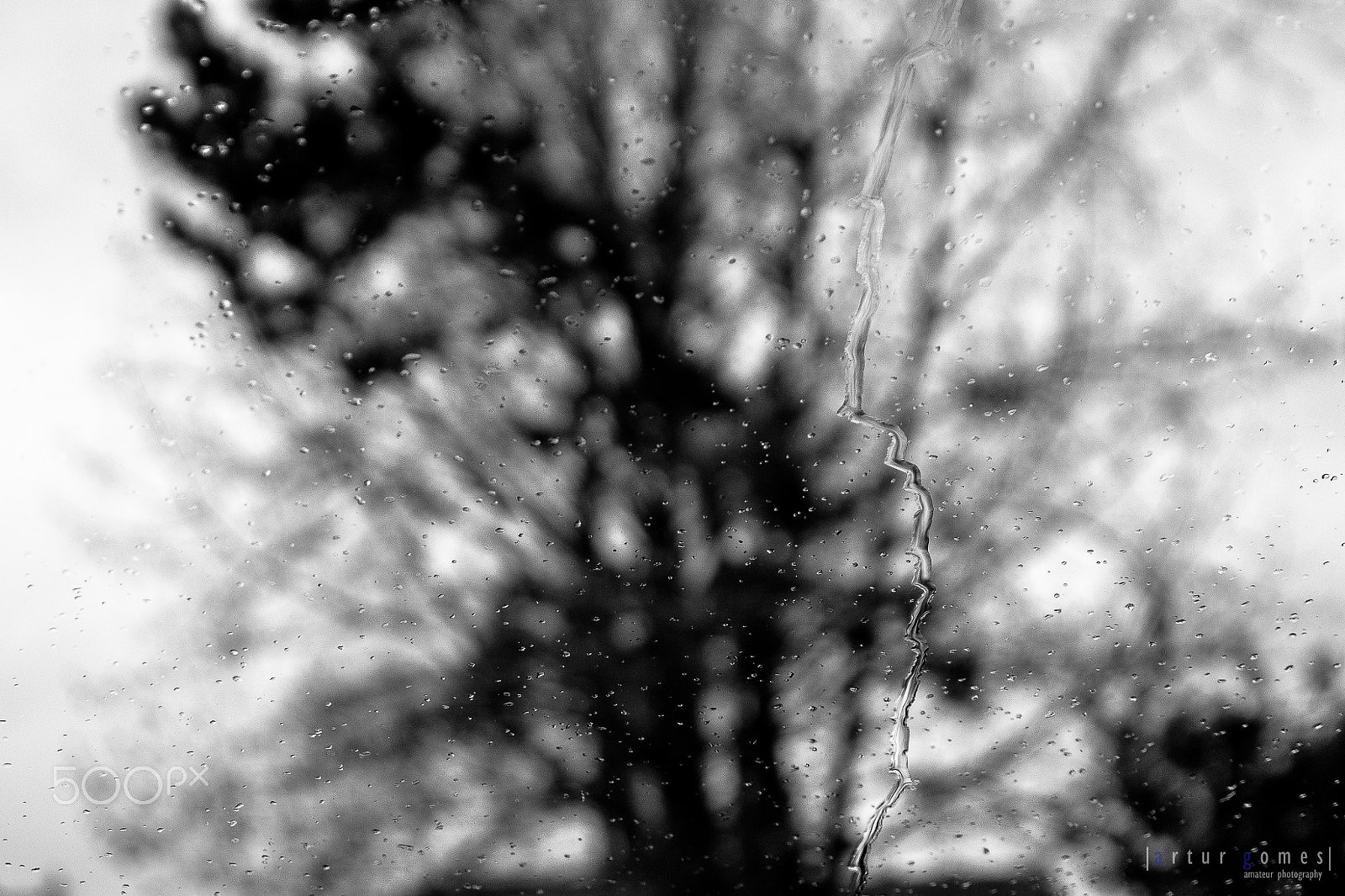 Panasonic Lumix DMC-GH2 sample photo. Rays of rain... photography