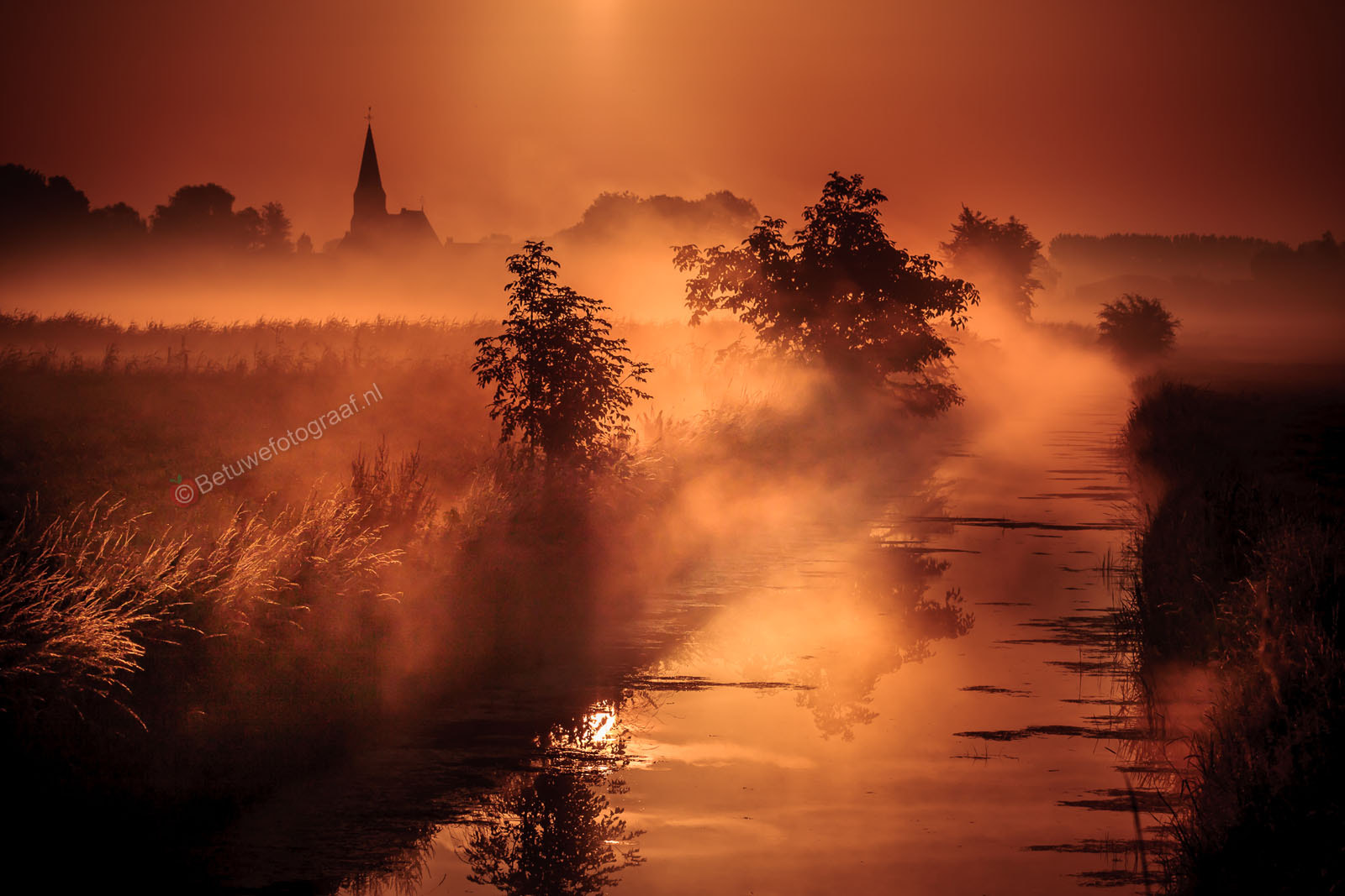 Canon EOS 40D + Canon EF 100mm F2.8L Macro IS USM sample photo. Golden morninglight on a lttle village ( gellicum photography