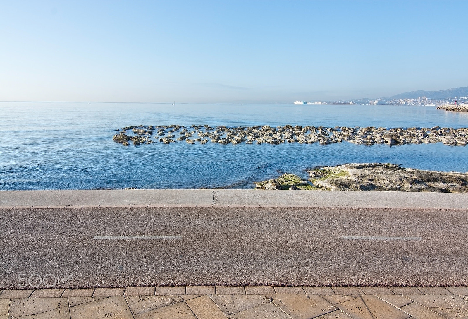 Nikon D7100 + AF Nikkor 35mm f/2 sample photo. Sunny bike route along the mediterranean photography