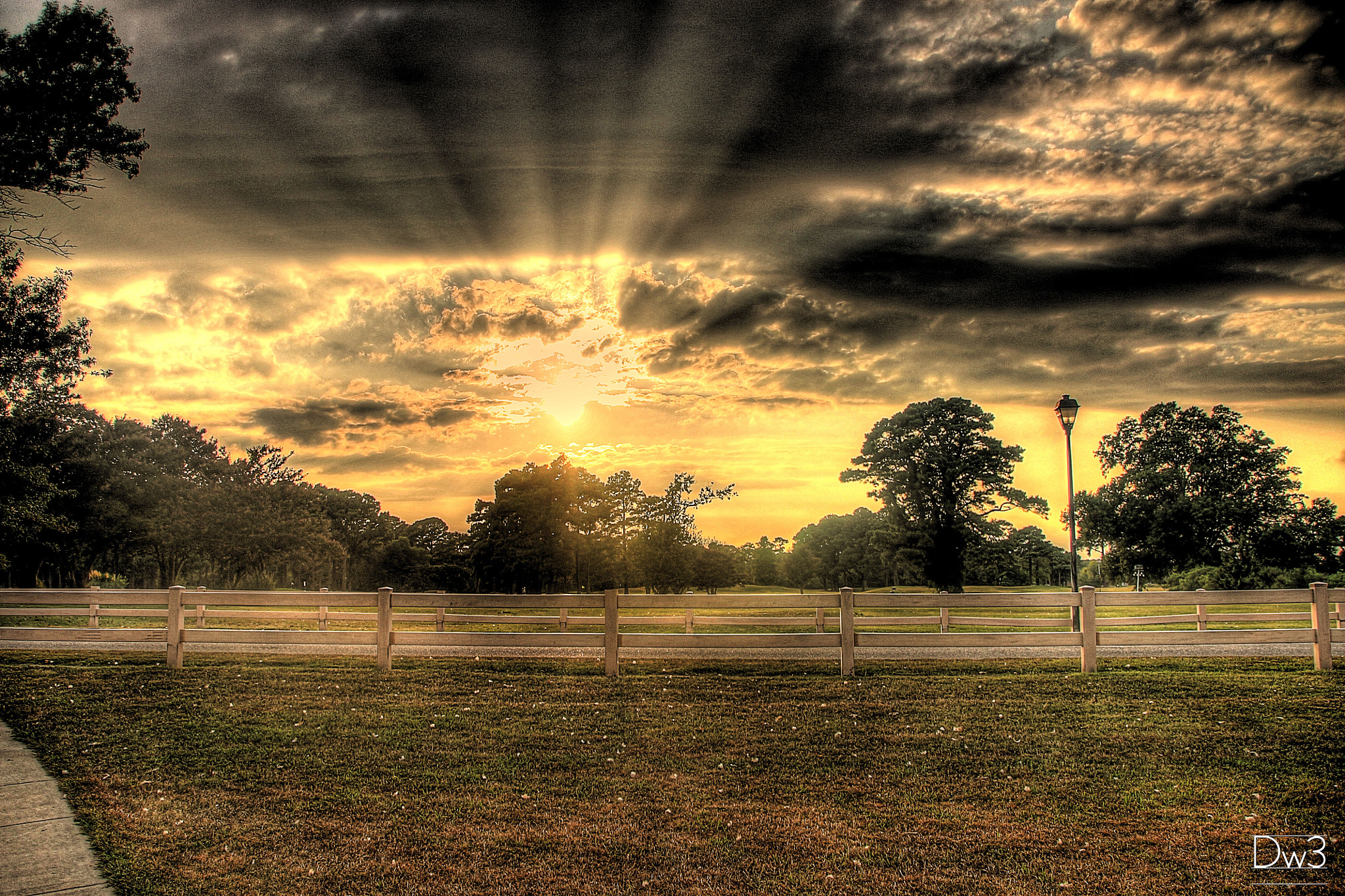 Sigma 18-250mm F3.5-6.3 DC OS HSM sample photo. __sun and dark clouds__ photography