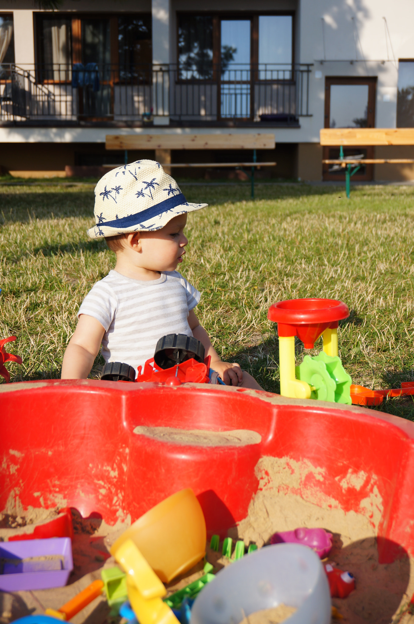 Sony Alpha NEX-5N + Sony E 18-50mm F4-5.6 sample photo. Boy and toys photography