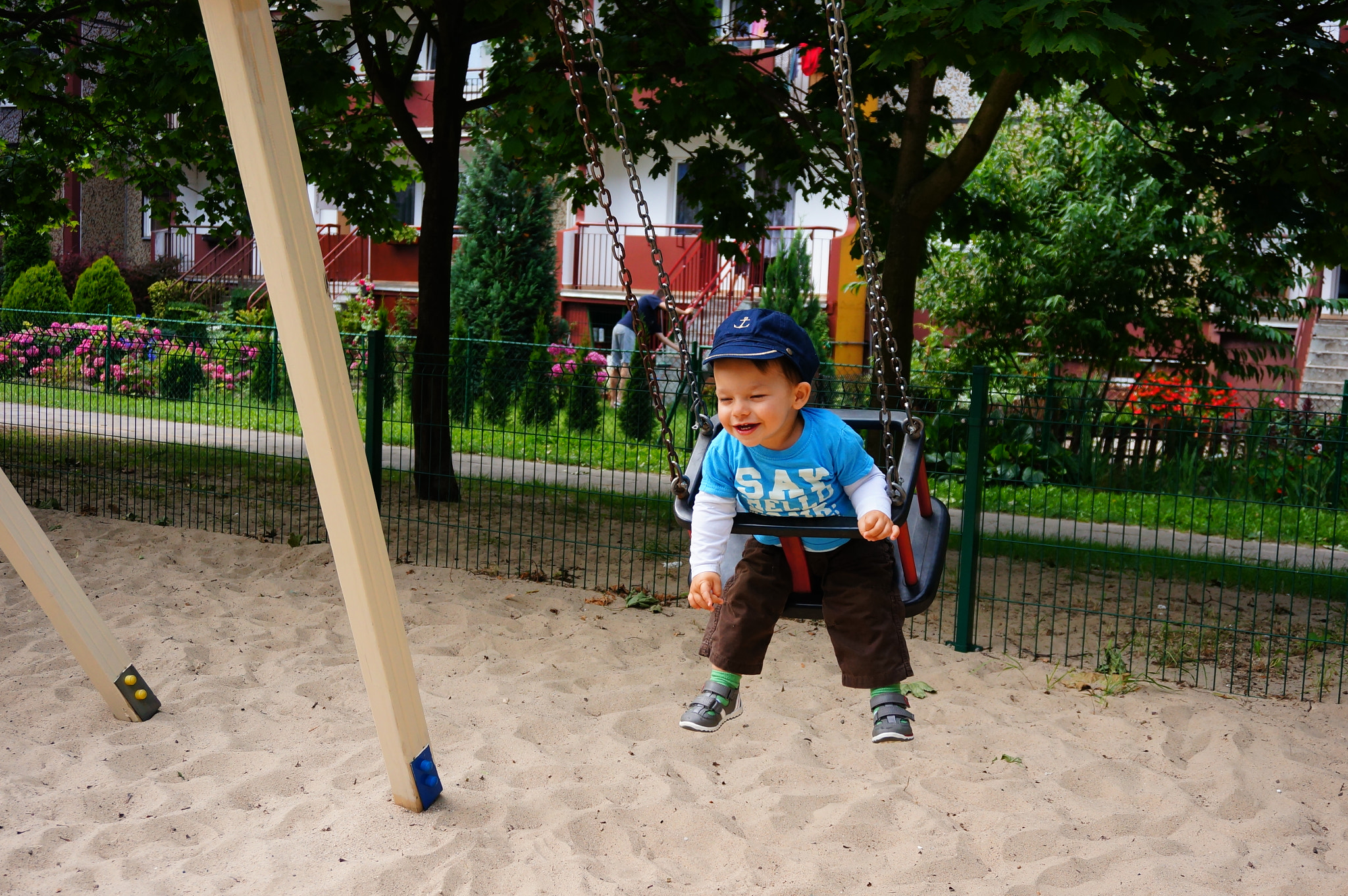 Sony Alpha NEX-5N + Sony E 18-50mm F4-5.6 sample photo. Swinging boy photography