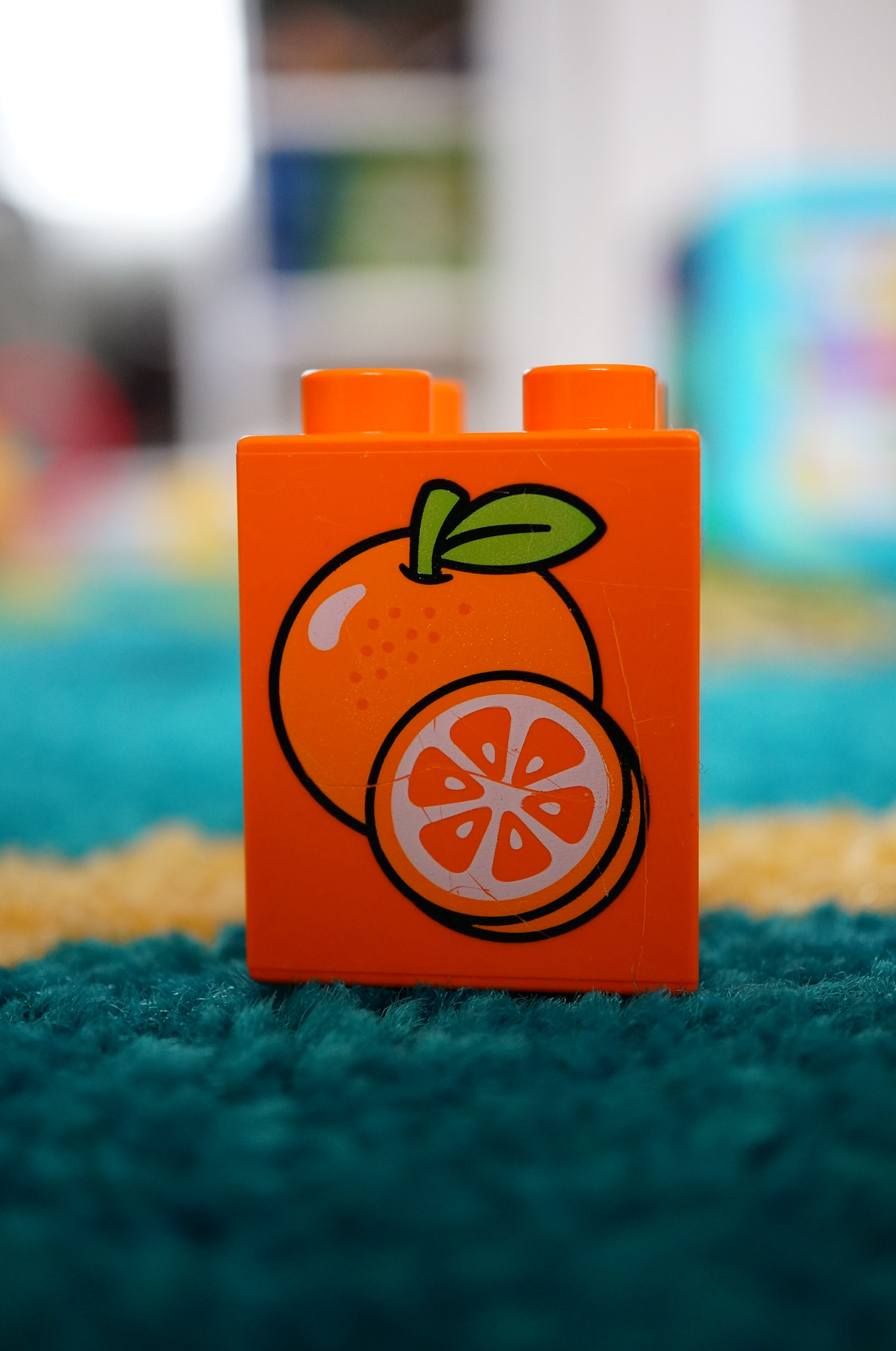 Sony Alpha NEX-6 + Sony E 30mm F3.5 Macro sample photo. Orange lego duplo block photography