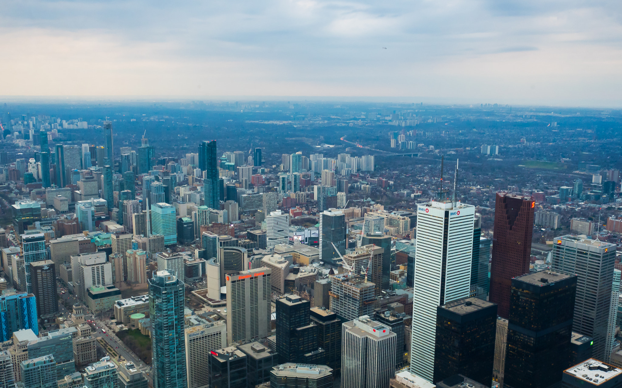 Olympus OM-D E-M5 II + Olympus M.Zuiko Digital 17mm F2.8 Pancake sample photo. View on top of cn tower photography