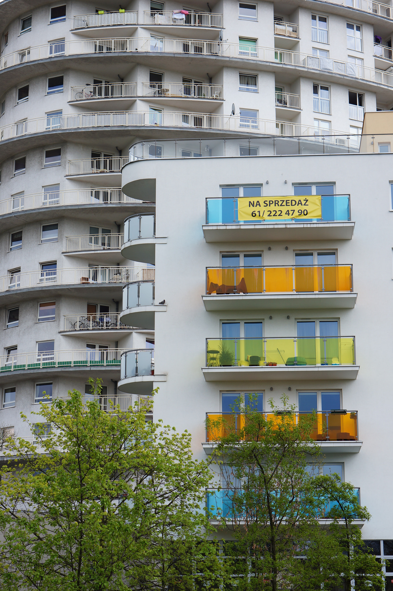 Sony Alpha NEX-5N + Sony E 50mm F1.8 OSS sample photo. Building balconies photography