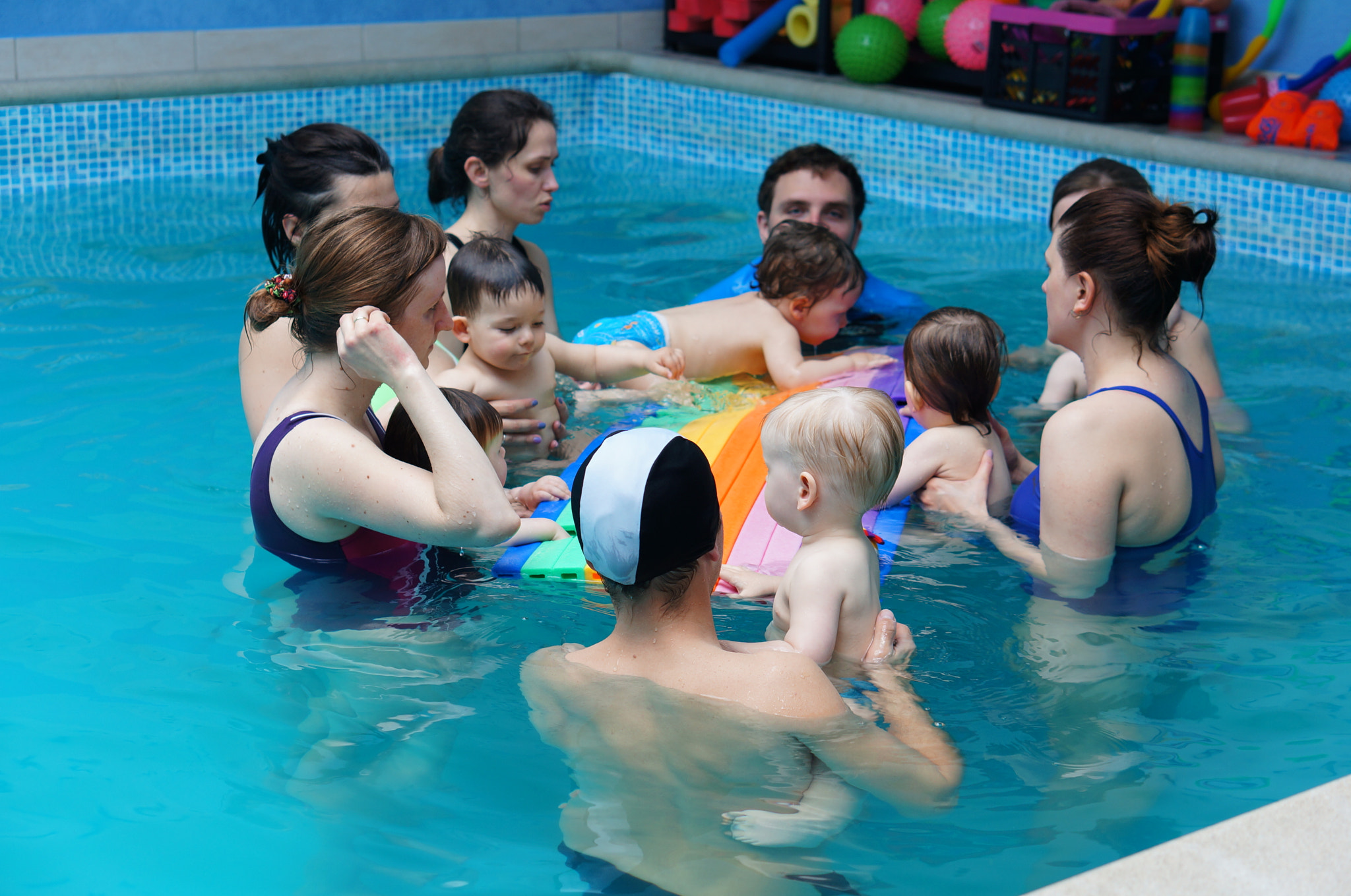 Sony Alpha NEX-5N + Sony E 50mm F1.8 OSS sample photo. Baby swimming classes photography
