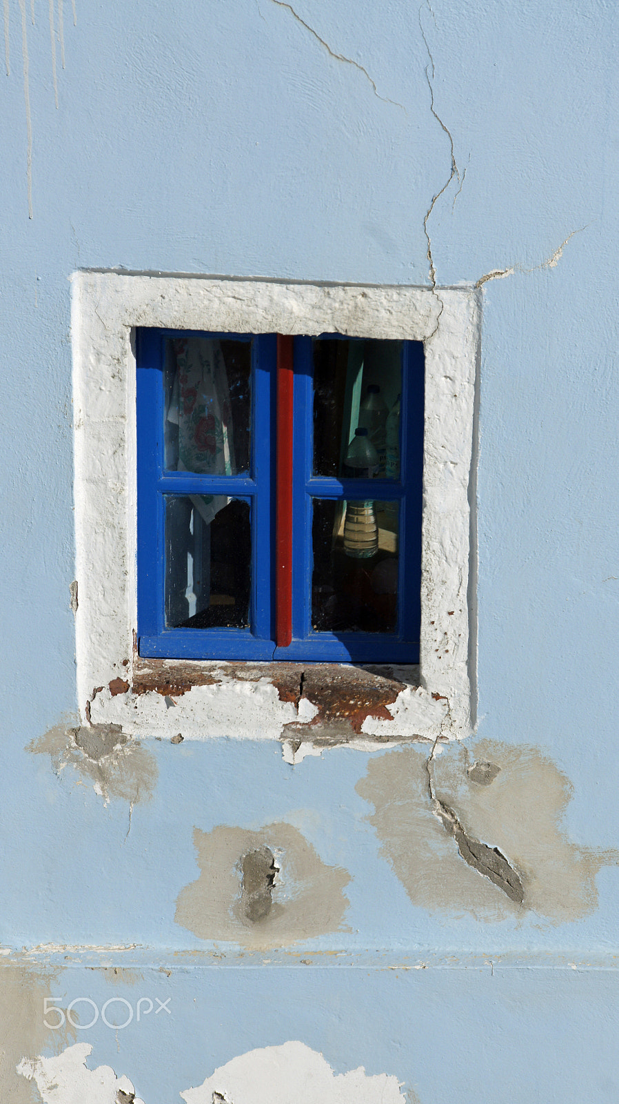 Sony Alpha NEX-3 + Sony E 18-200mm F3.5-6.3 OSS sample photo. Traditional greece architecutre in oia on santorini island photography