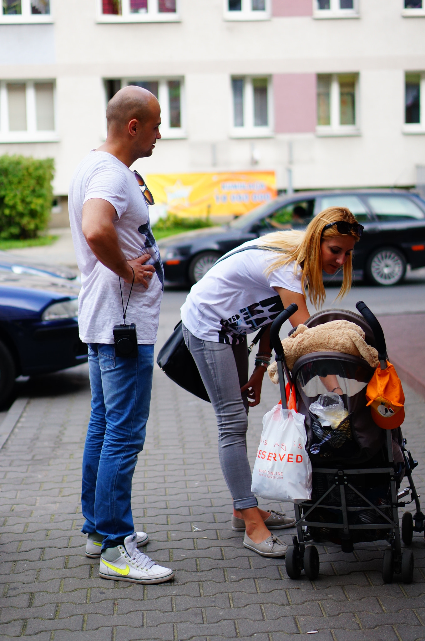 Sony Alpha NEX-6 + Sony E 50mm F1.8 OSS sample photo. Baby buggy and parents photography