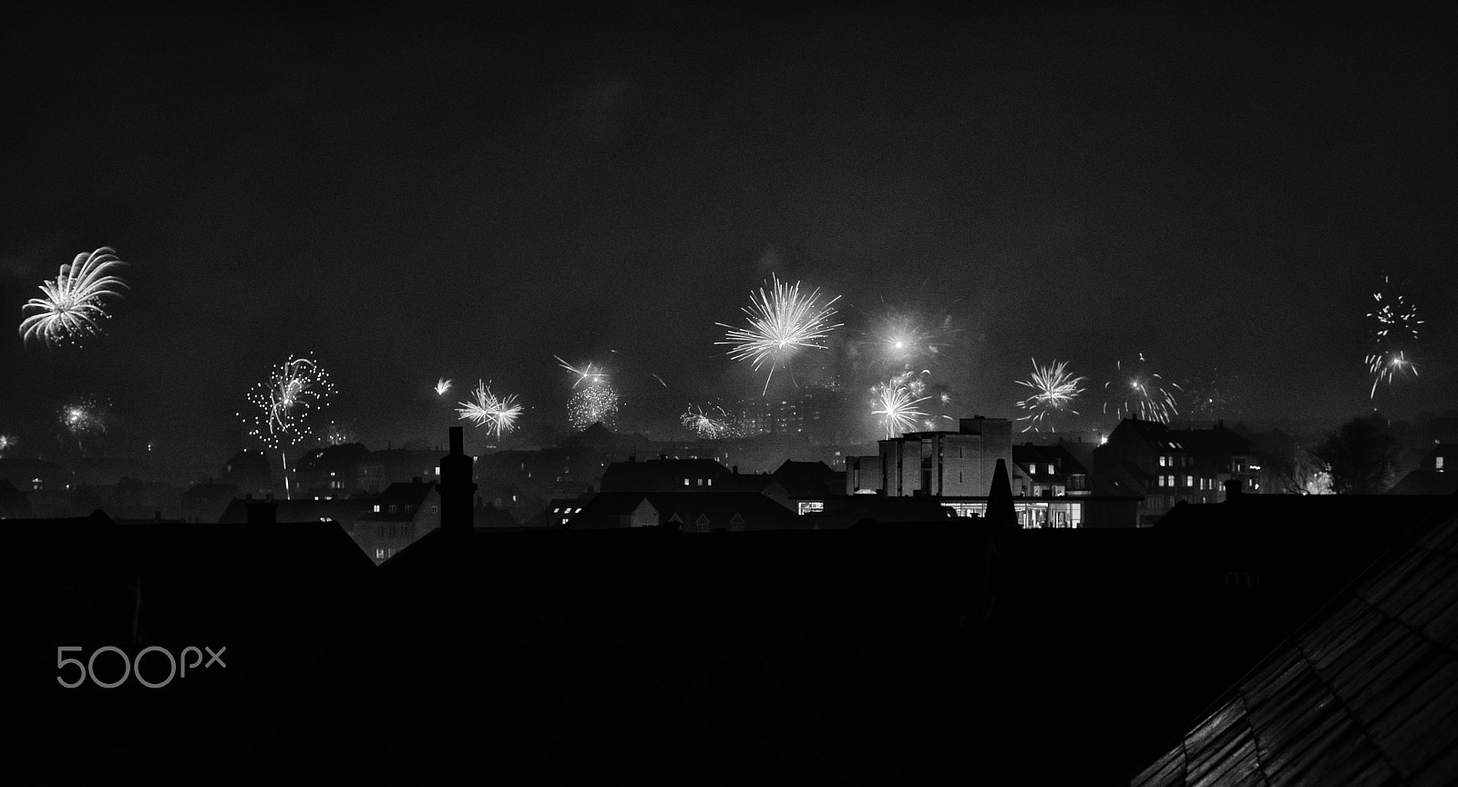 ZEISS Planar T* 50mm F1.4 sample photo. Happy new year form the rooftops photography