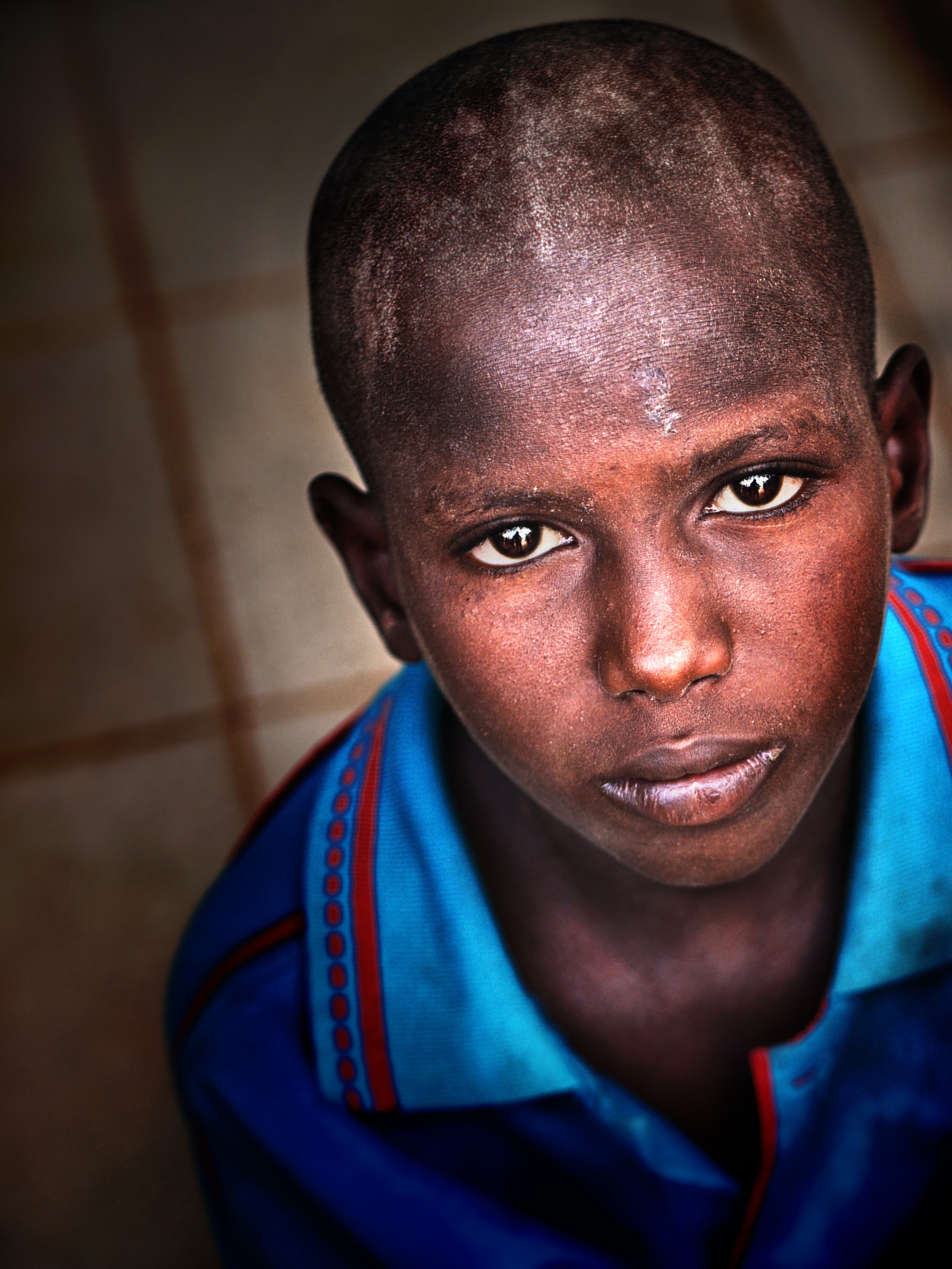 Panasonic Lumix DMC-G1 + Olympus M.Zuiko Digital 45mm F1.8 sample photo. Gambian villager photography